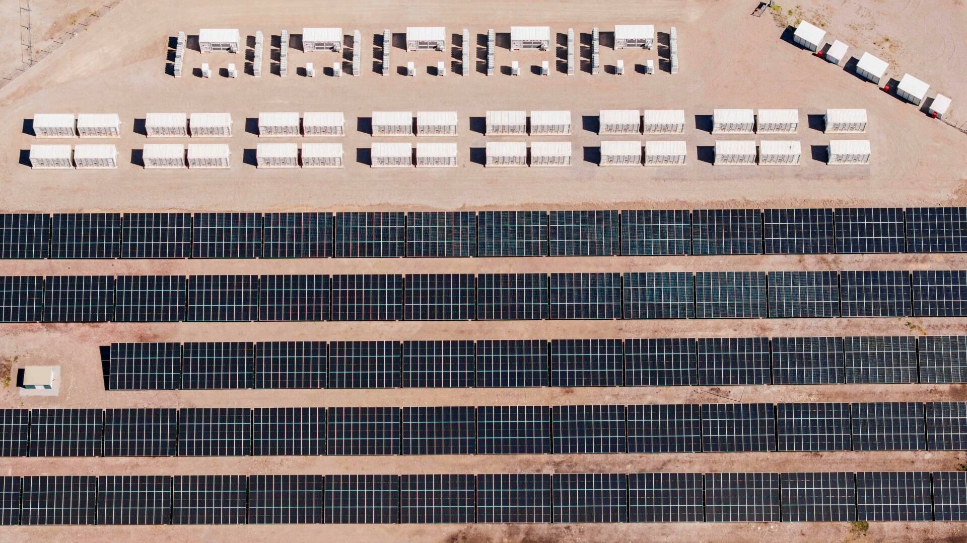 Rows of solar panels and batteries from above
