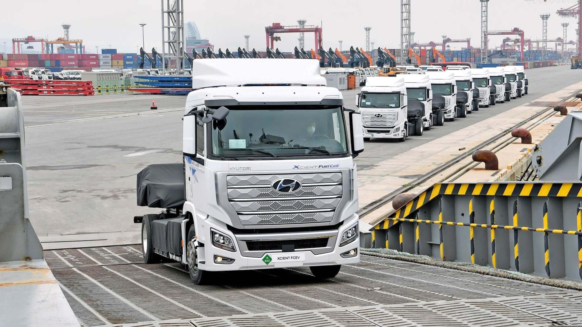 Hyundai’s fuel cell trucks in a line at port side
