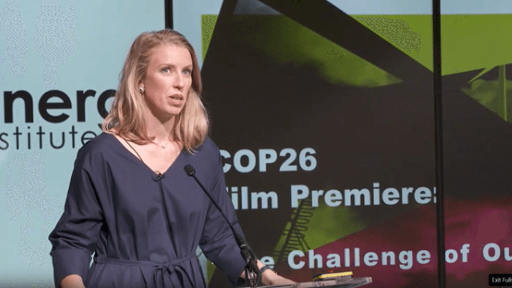 Hannah Mary Goodlad speaking from podium during COP26