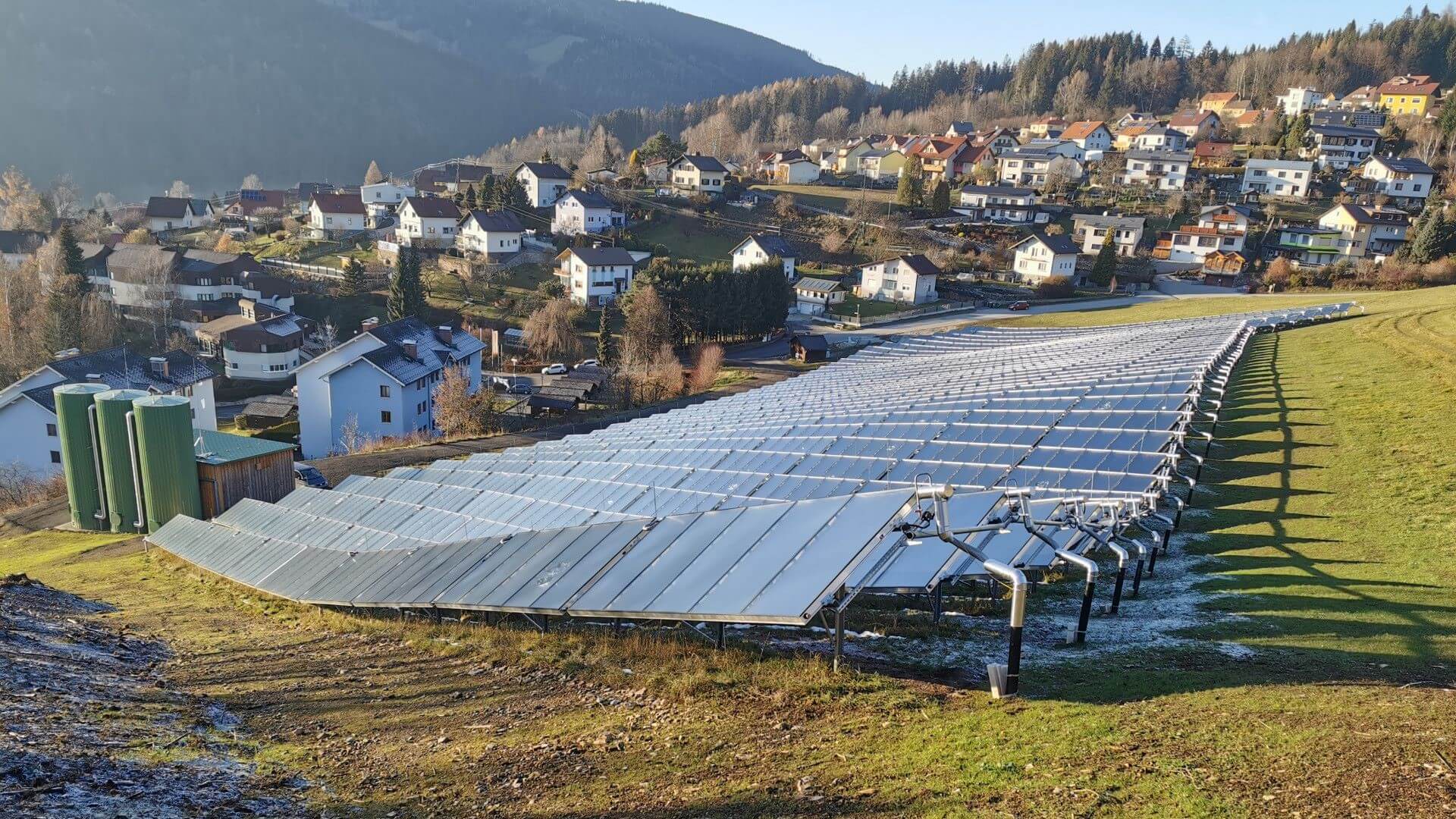 Overview of hillside solar thermal array with heat storage tanks – a challenging site