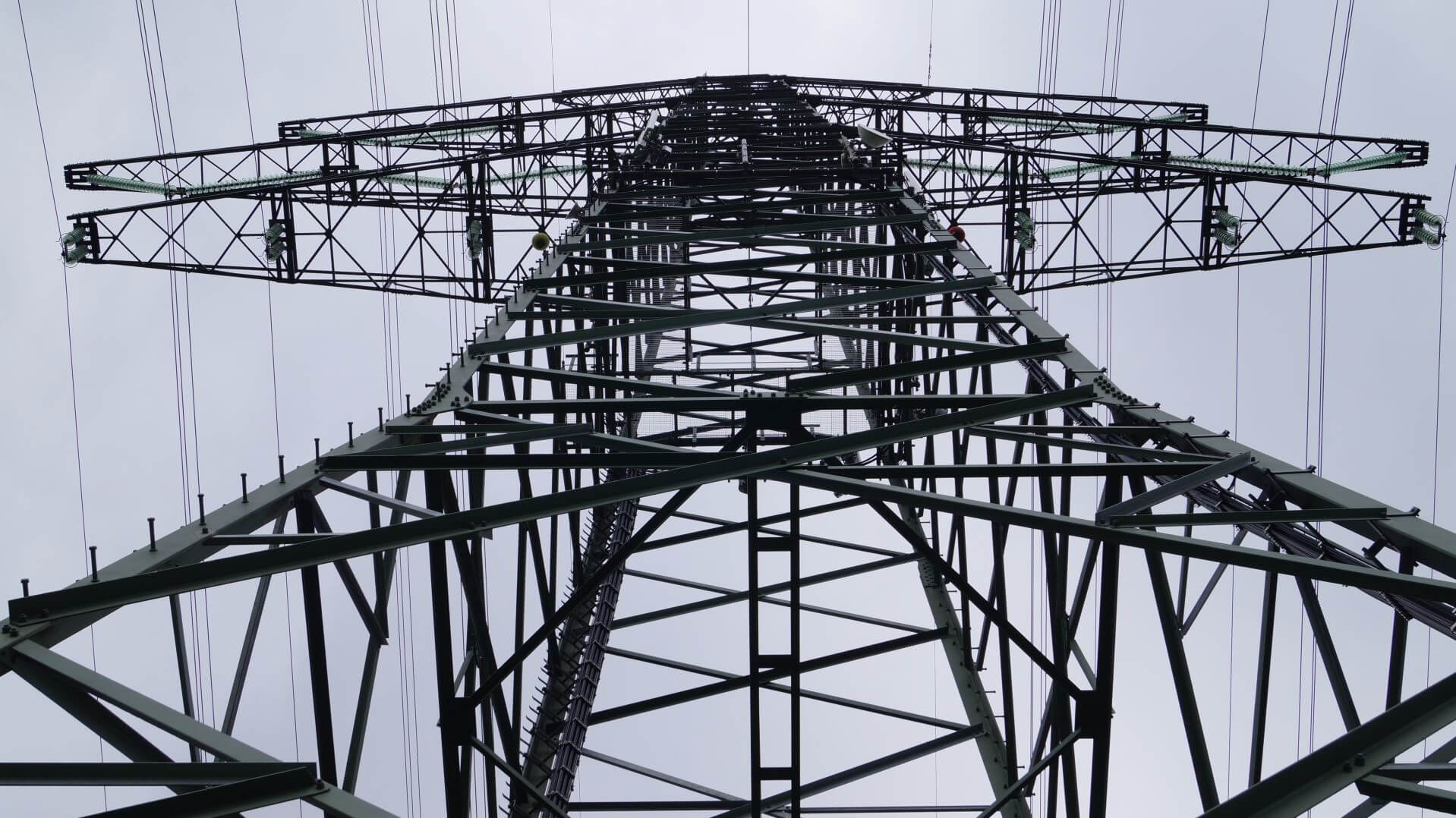 Electricity pylon photographed from below