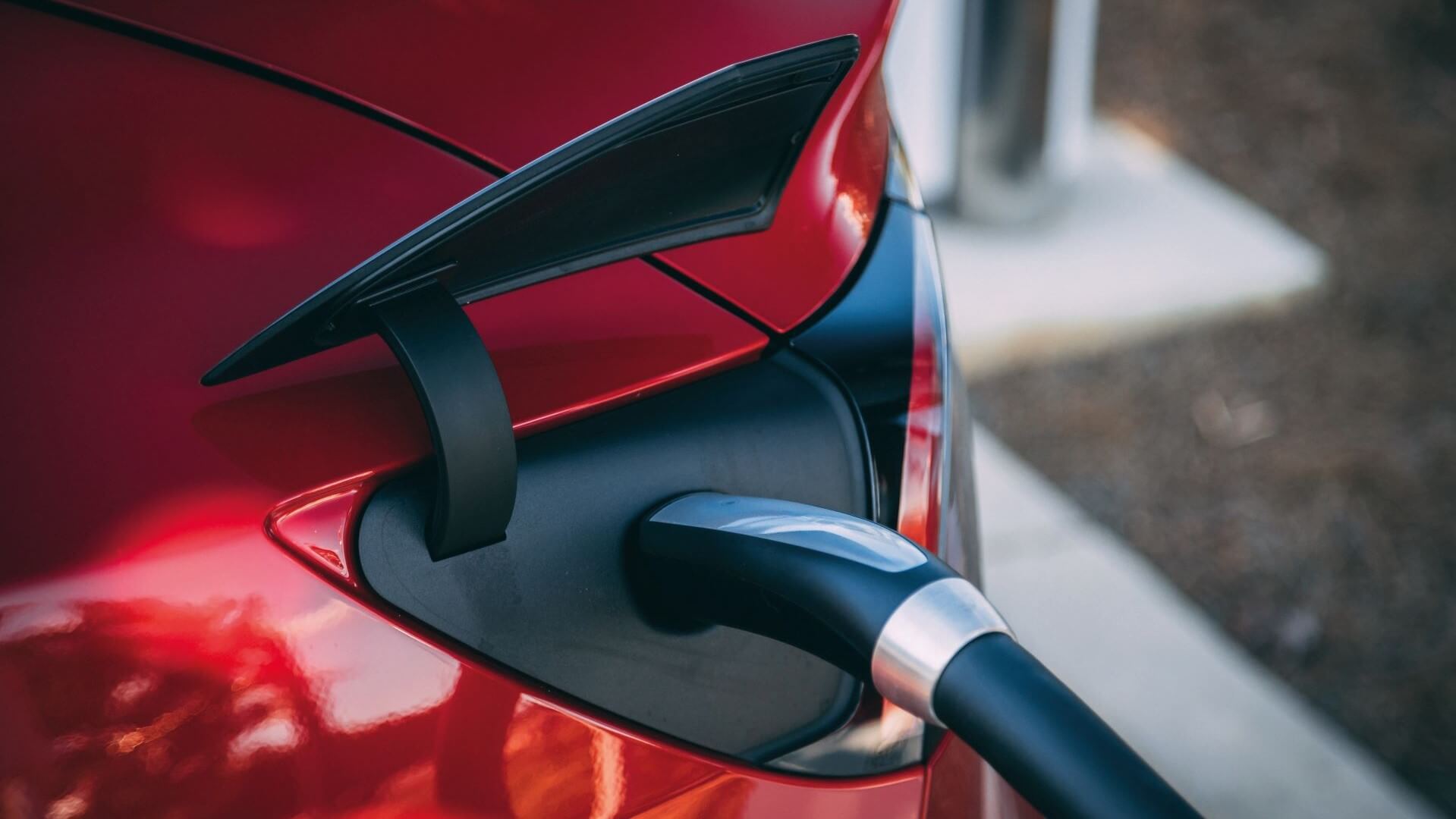 Tesla car being charged