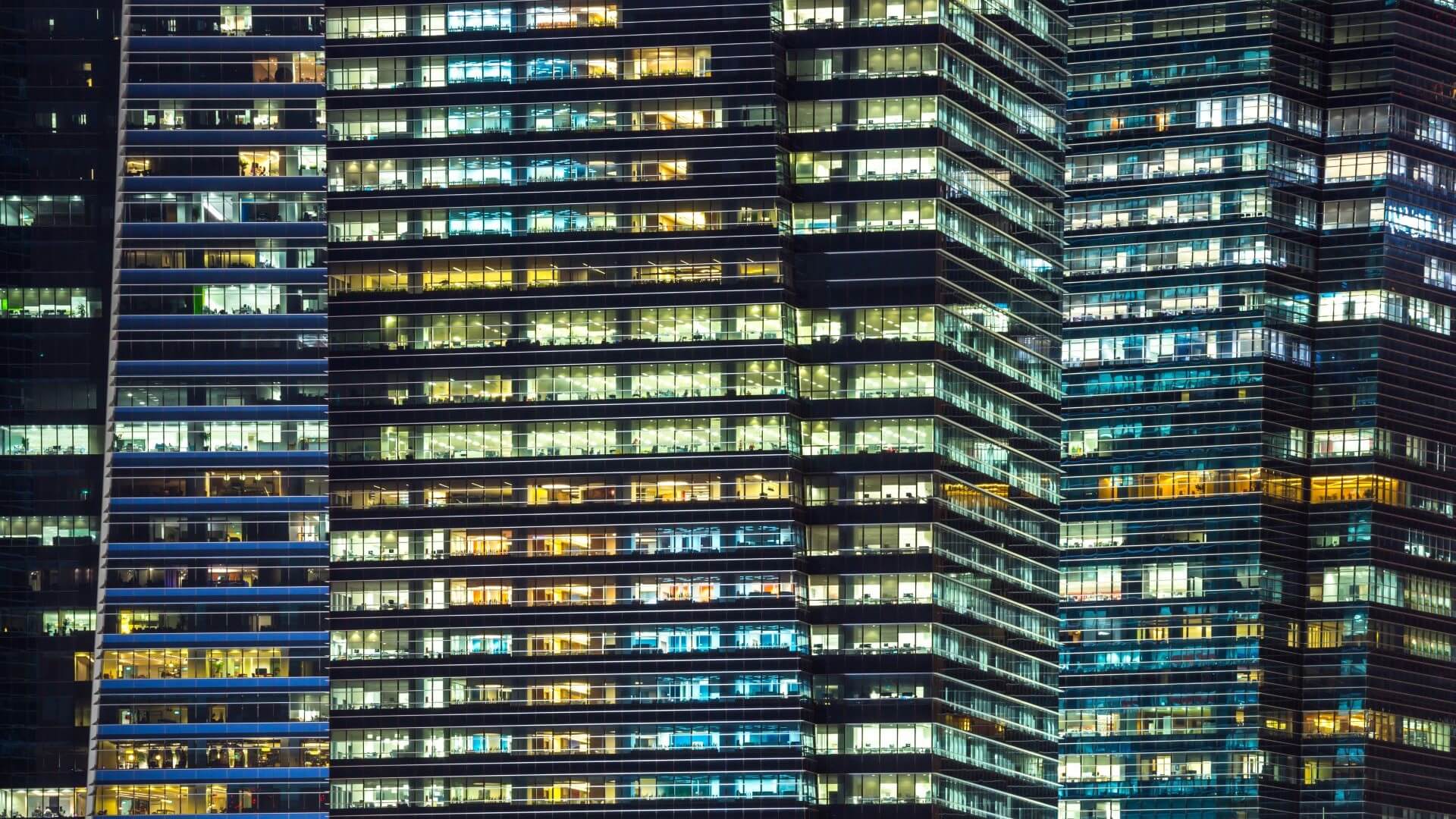 Office blocks with lights on at night