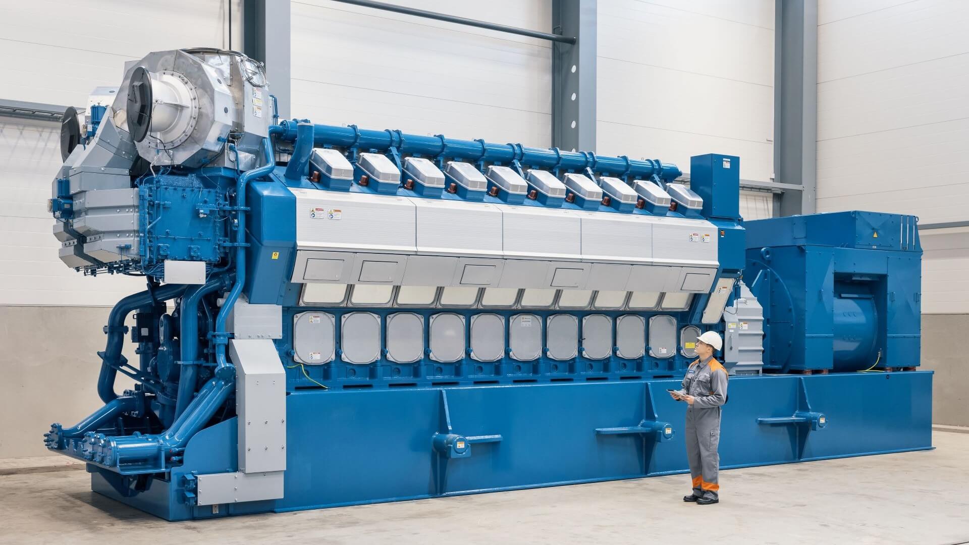Engineer examines Wärtsilä 34DF engine 