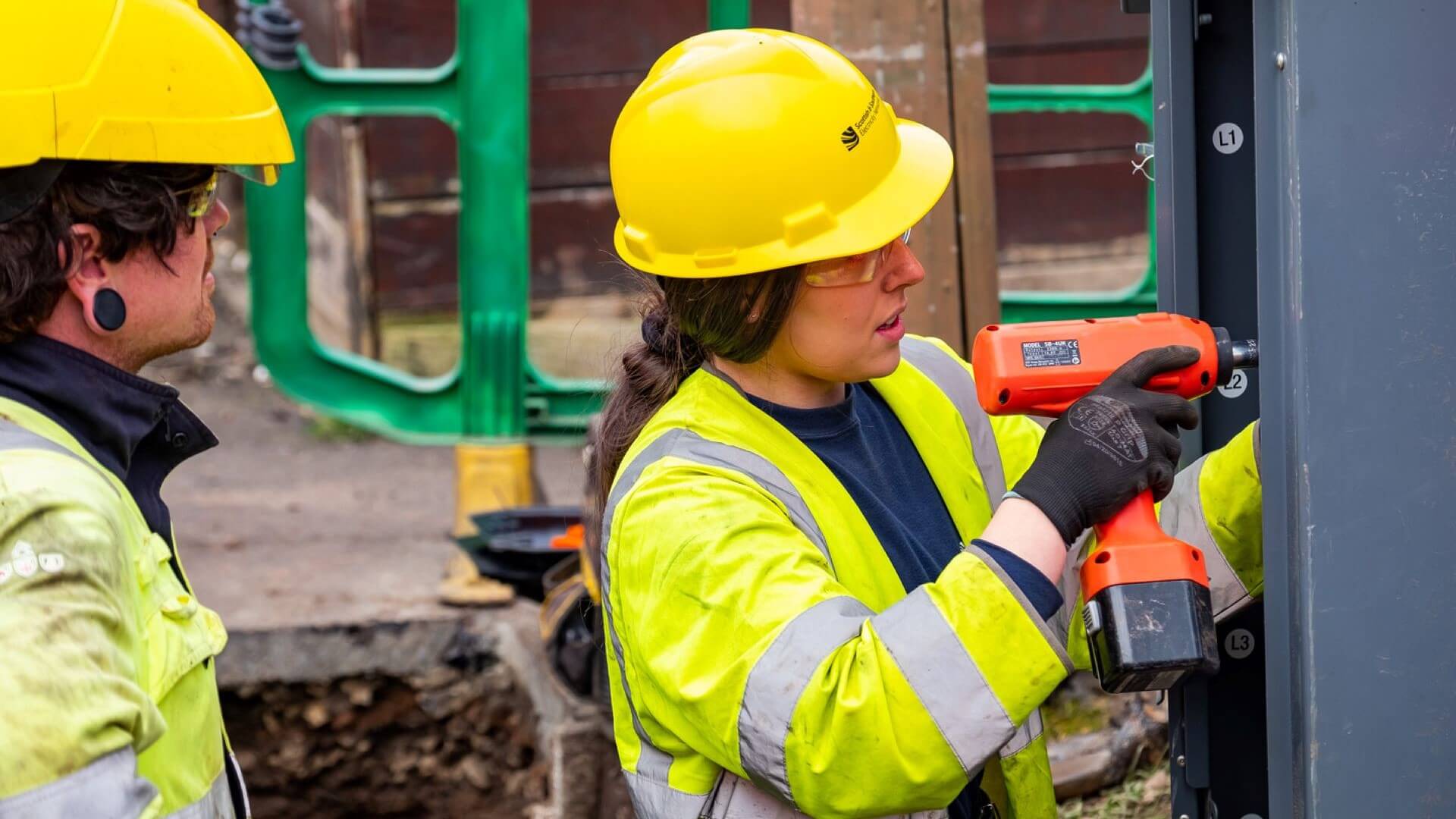 SSEN lines engineer using power tool to upgrade electricity network