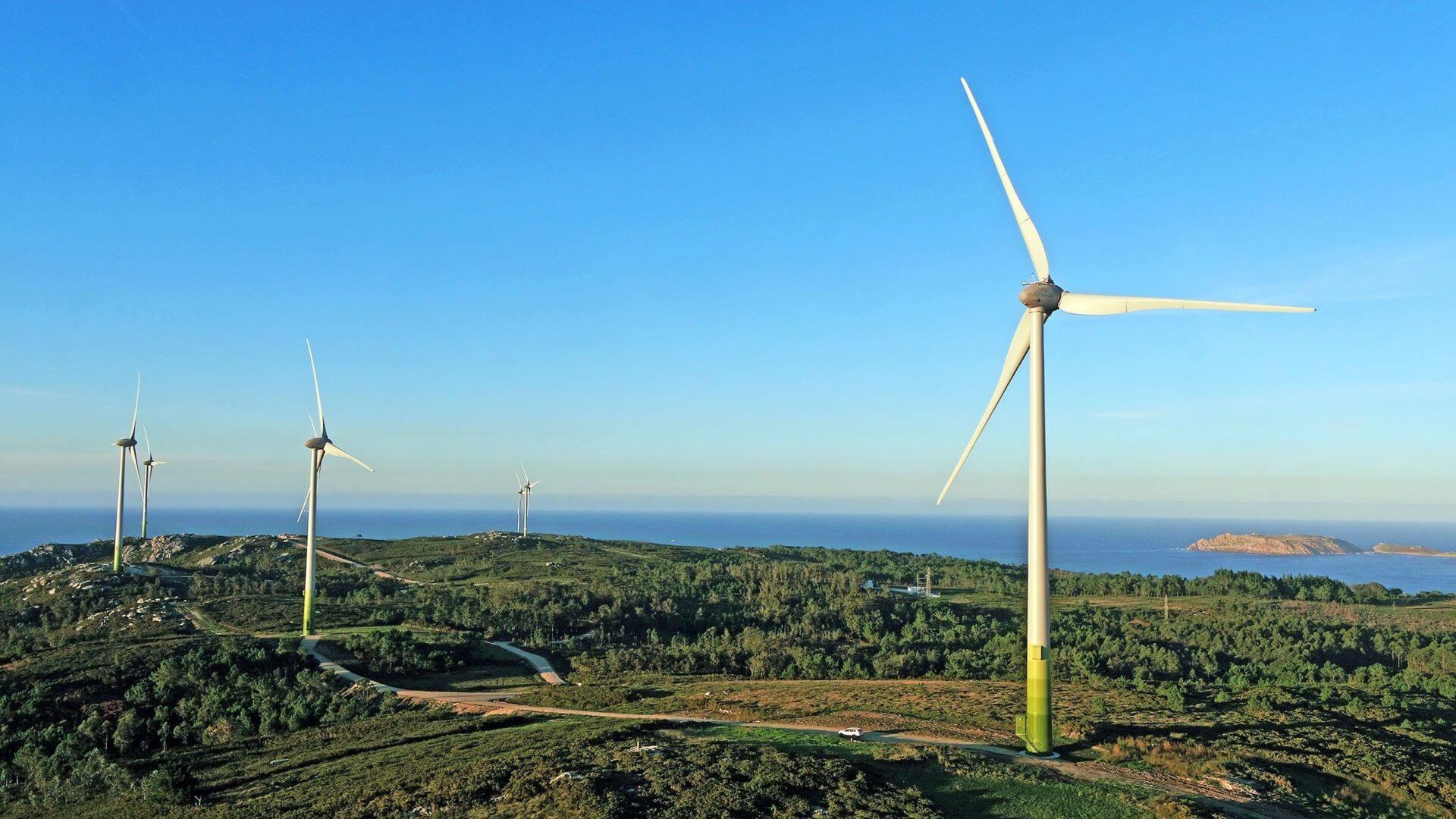 Malpic wind farm with one large turbine in foreground and other in distance