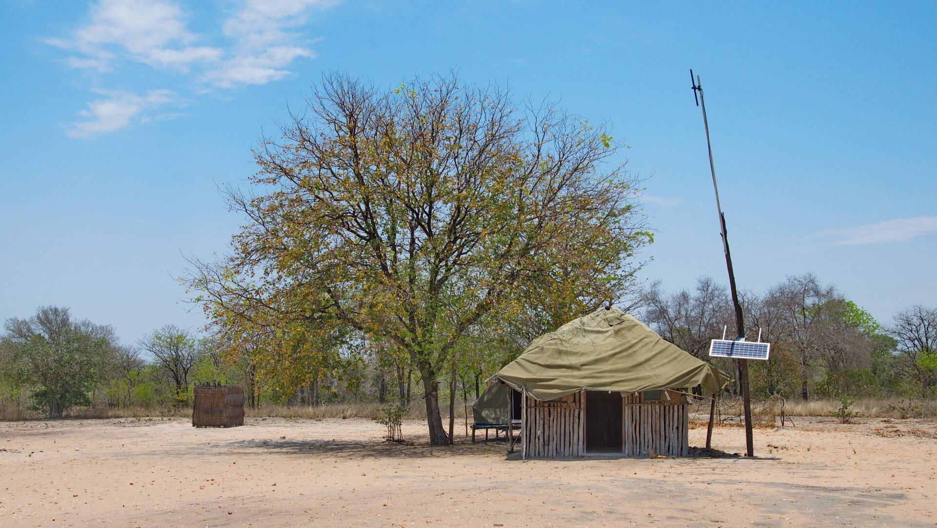 A hut in Mozambique with a solar panel