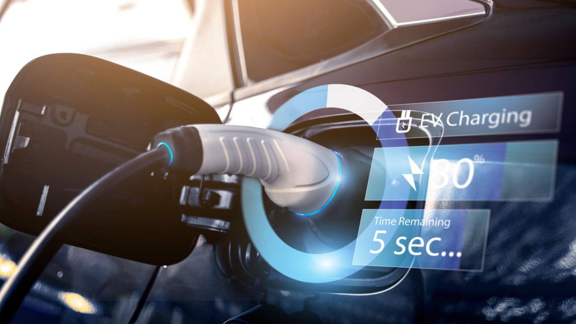 Close up of electric vehicle plugged in to charger