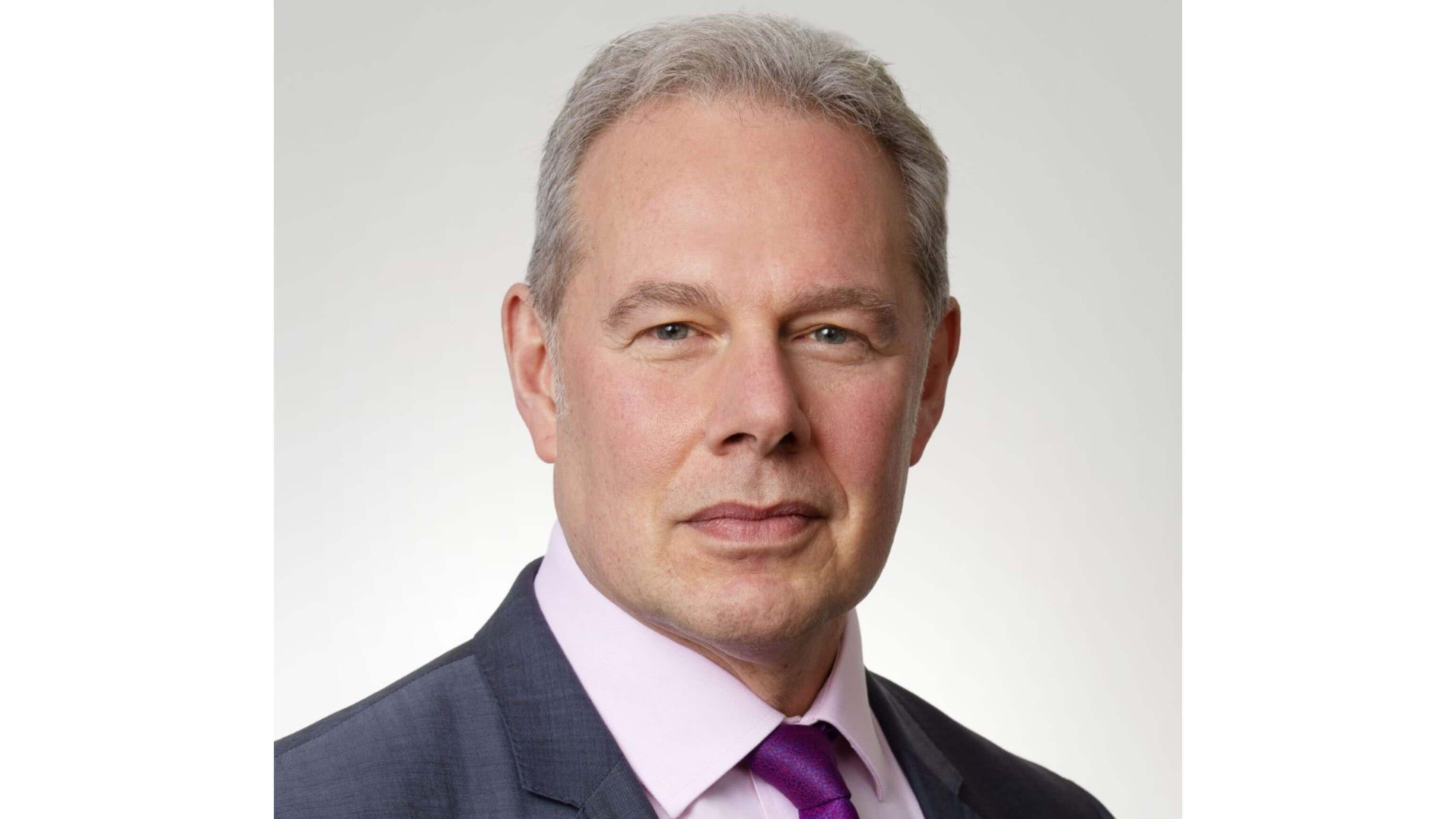 Head and shoulders photo of Adrian Del Maestro, Director of PwC Strategy&