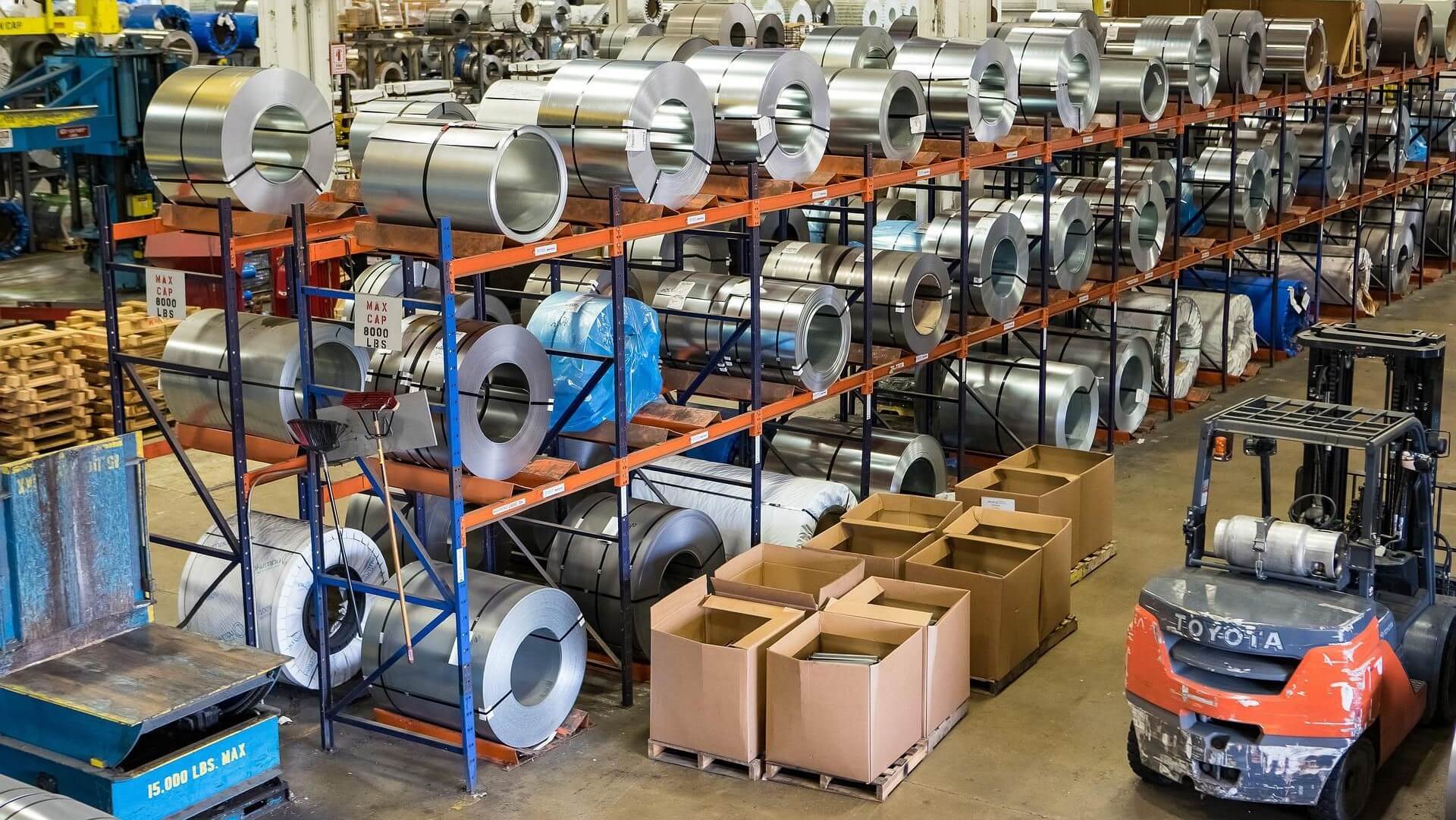 Stacked shelves in warehouse filled filled with steel coil