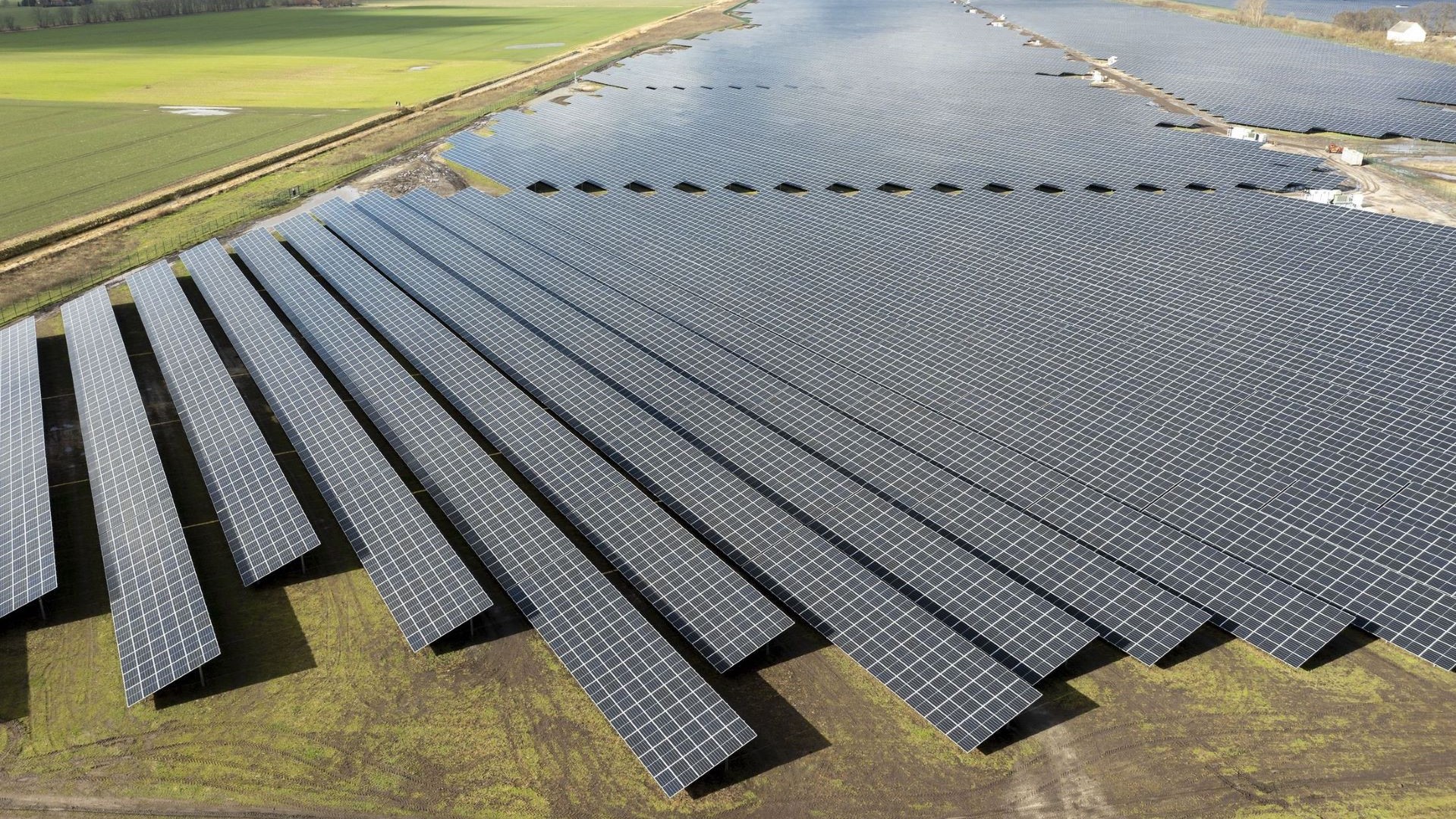 Aerial view over large solar park in Germany