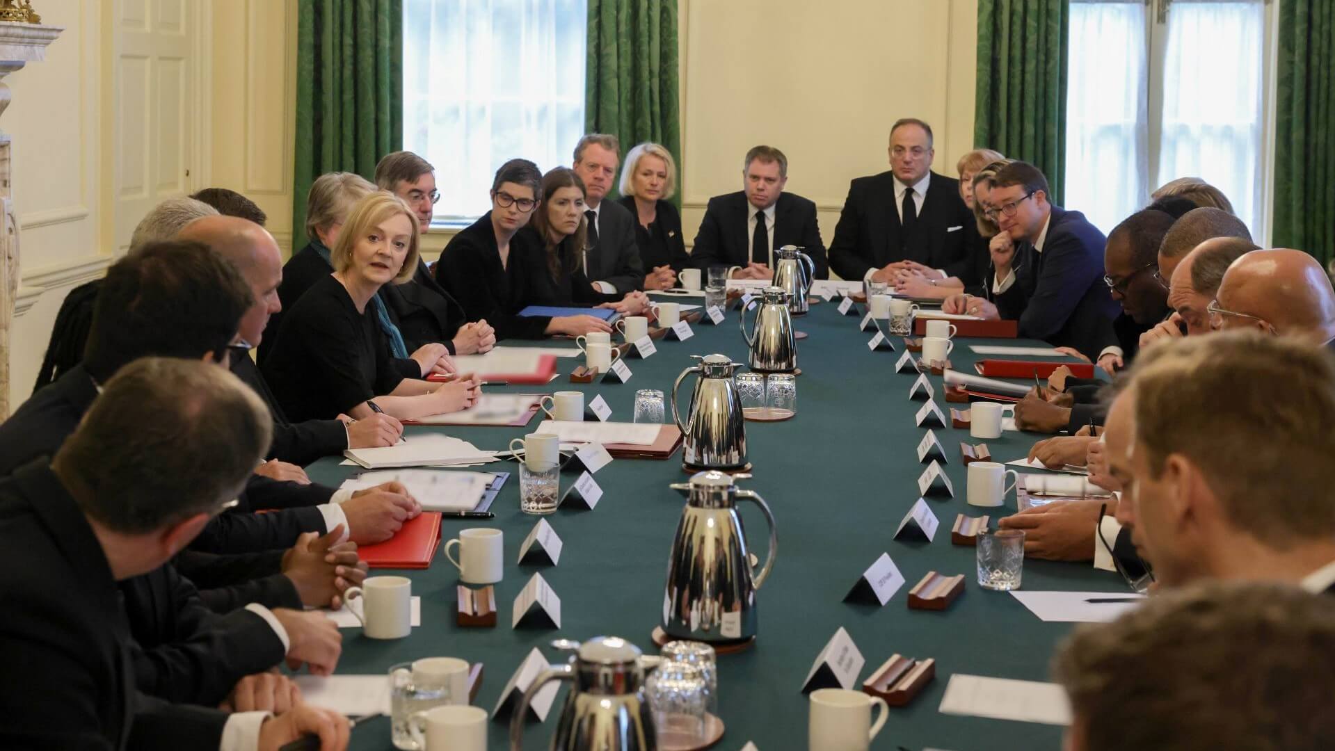 UK PM Liz Truss and MPs in discussion around table