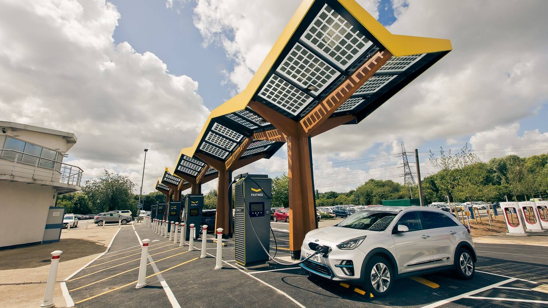 EV car charging at row of chargers at Redbridge Park and Ride station