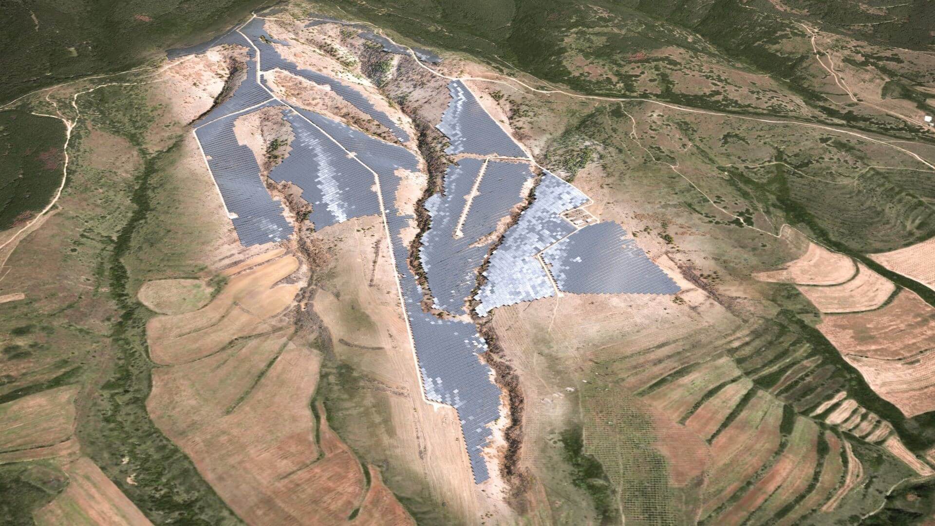 Artist's graphic showing aerial view of solar farm across mountainous terrain