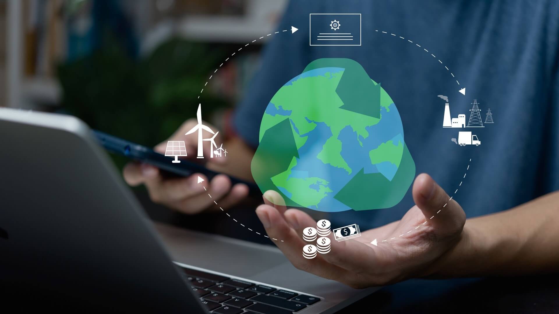 Graphic of sustainable earth concept against background of person working at laptop 