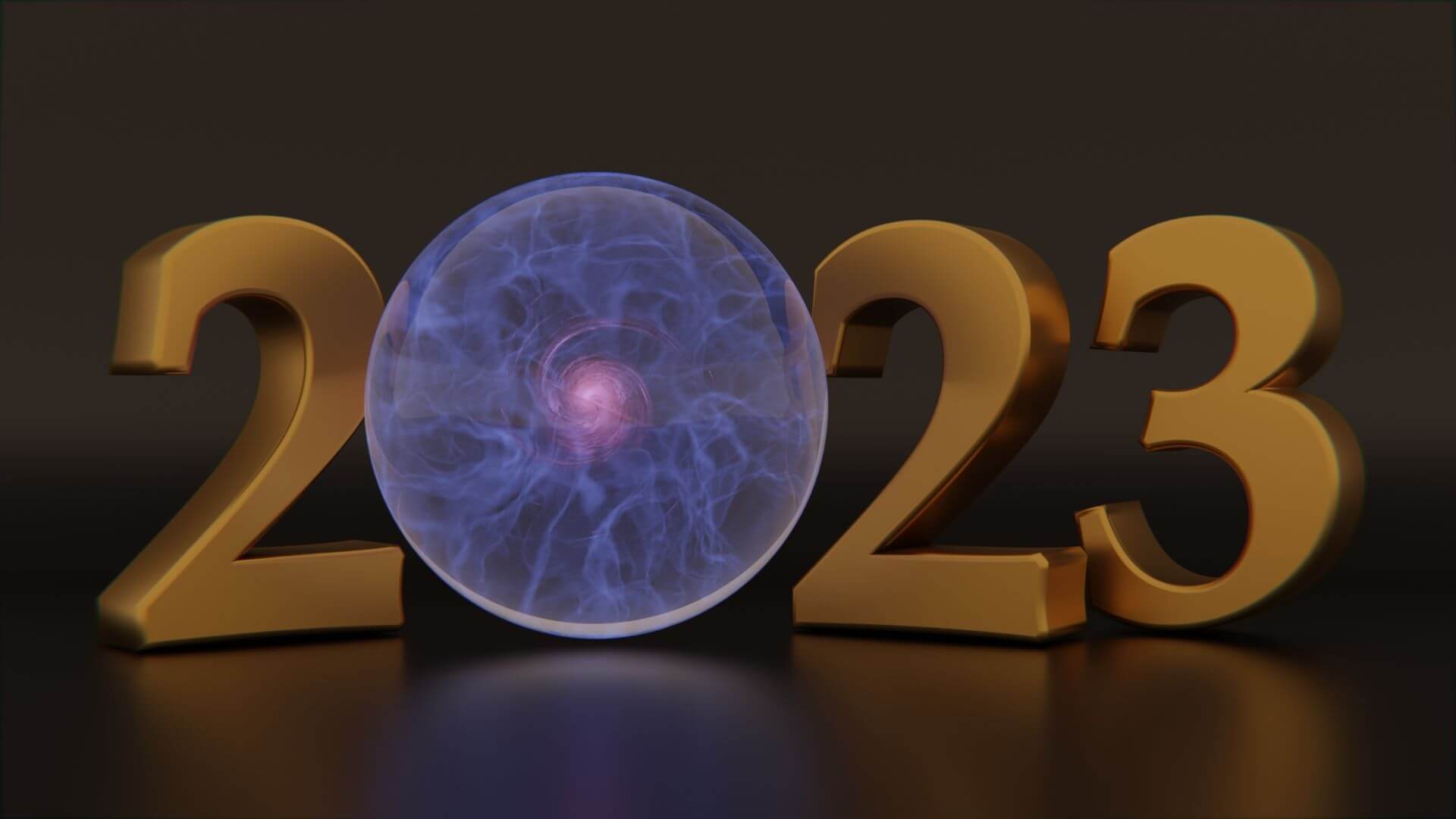 Computer graphic with 2023 in large gold letters standing up, with the zero of 2023 set as a crystal ball with pink and blue plasma lightning 