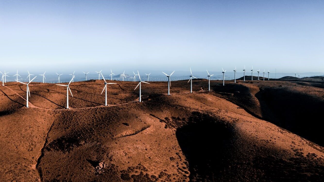 Aerial view of wind farm on hilly terrain