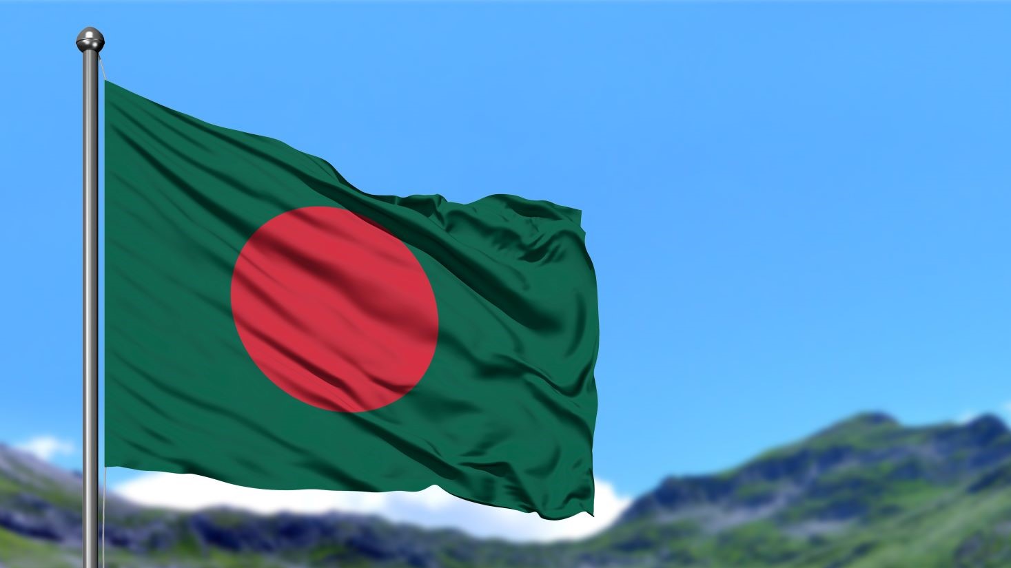 Bangladesh's flag waving and mountains in the background