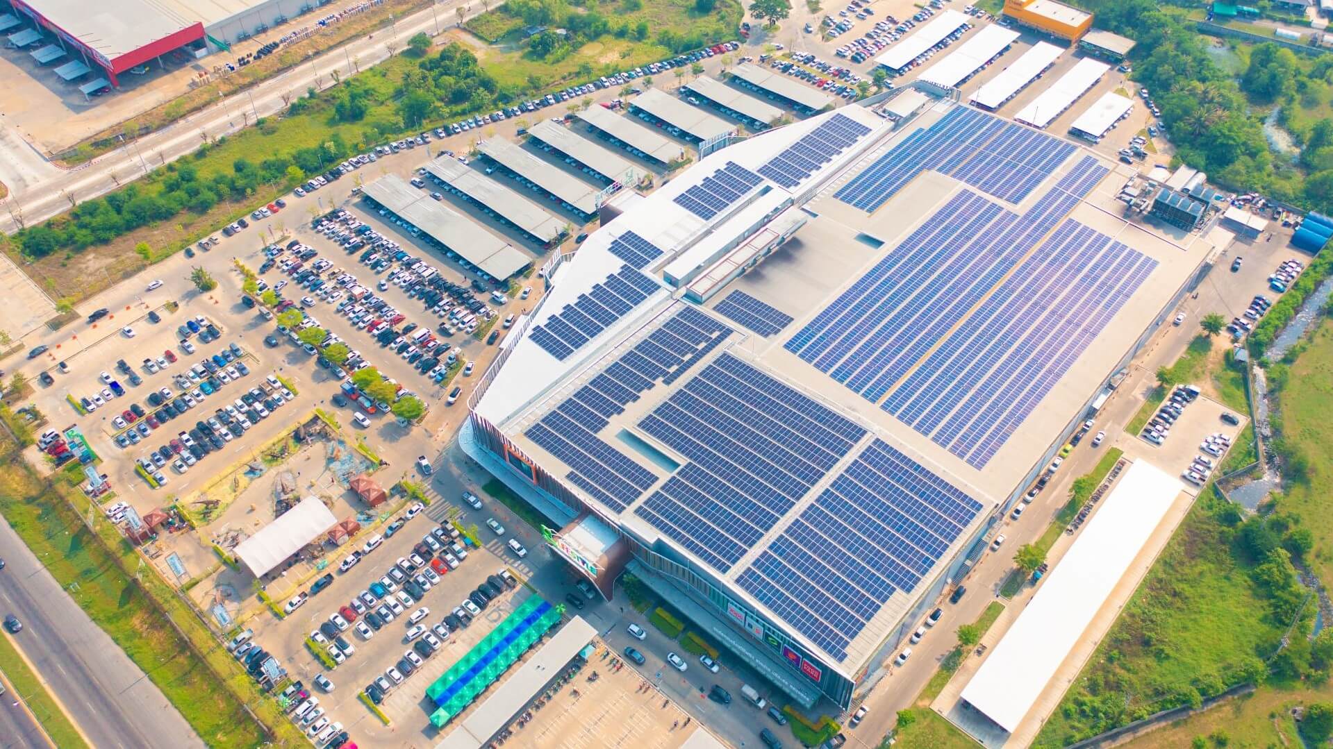 Aerial view of solar panel-covered roof of shopping centre