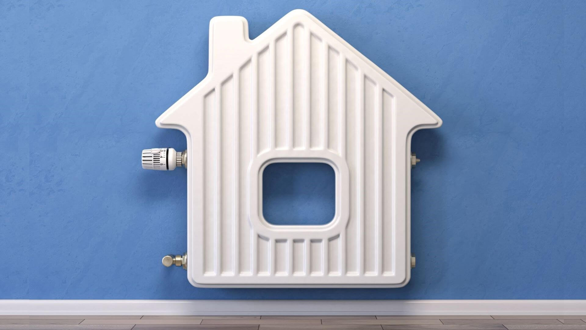 Radiator shaped as a house against blue wall