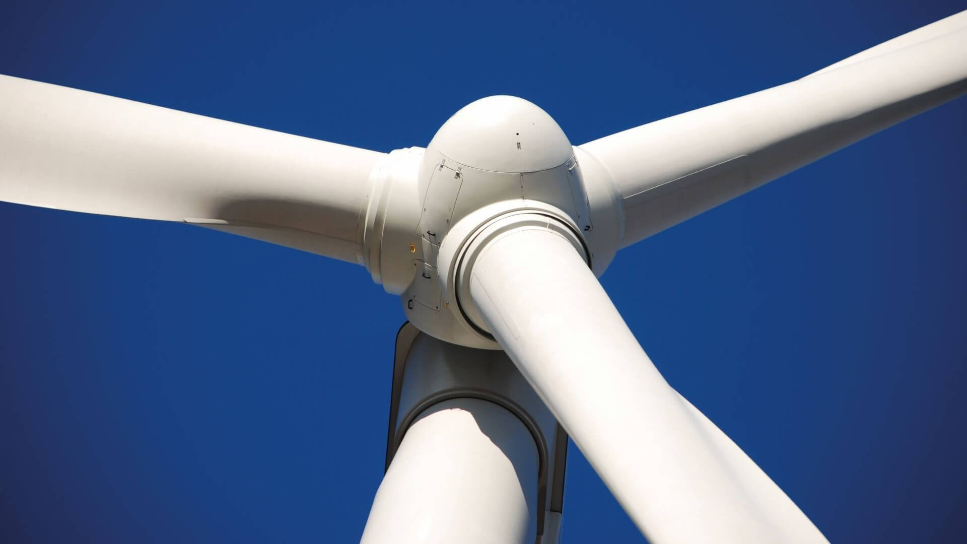 Closeup of wind turbine nacelle and blades