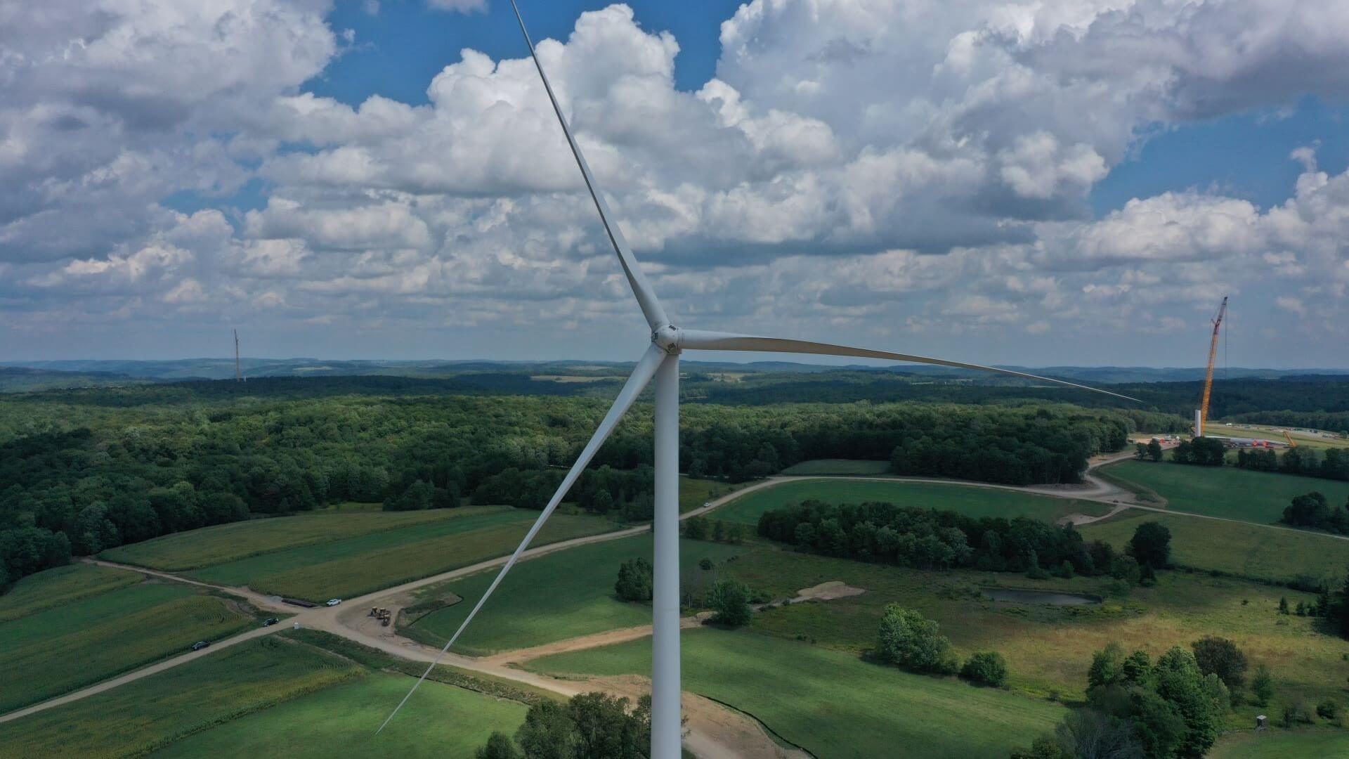 Close up of wind turbine in green field, New York State