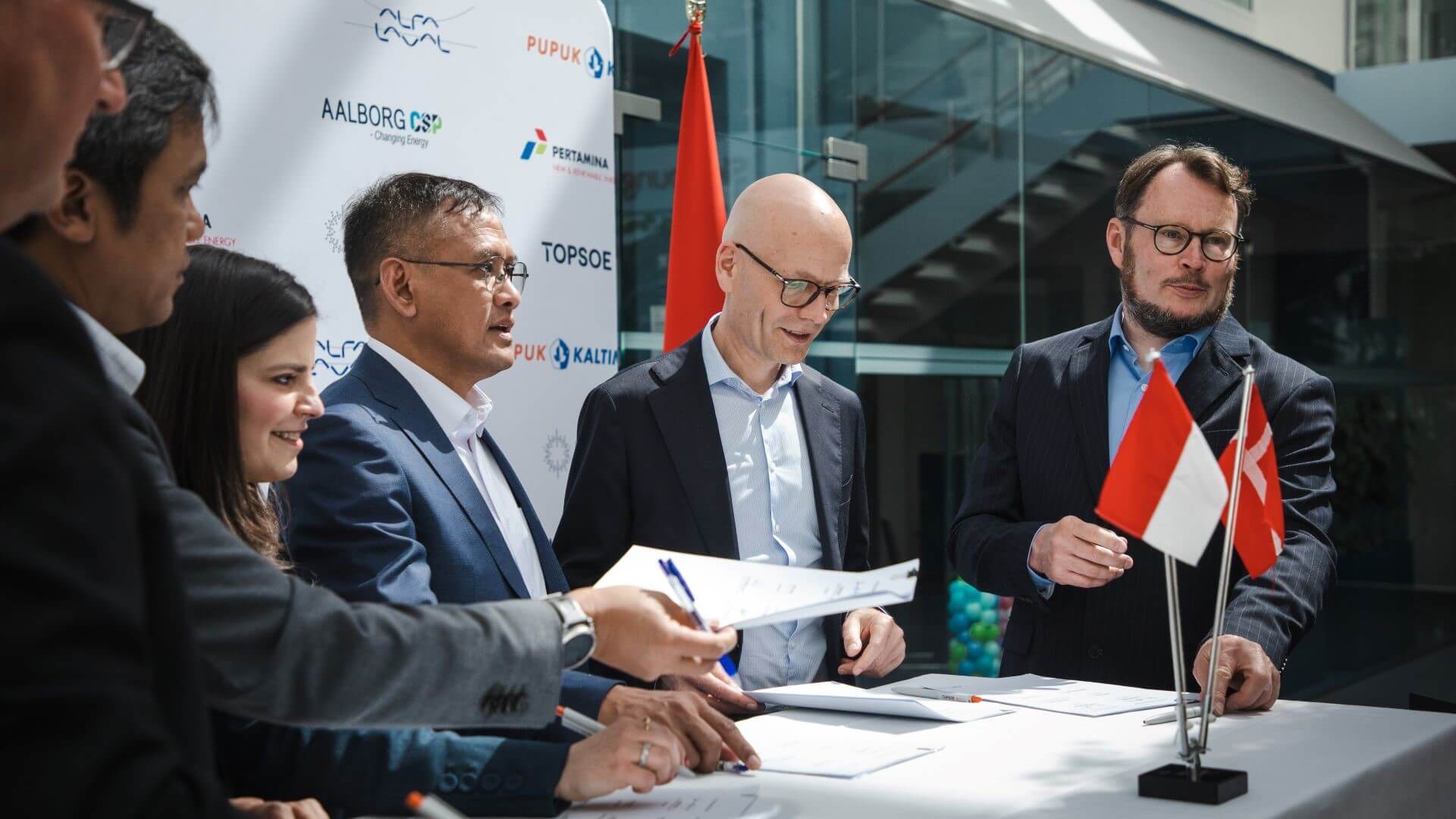 Company representatives during signing of agreement ceremony