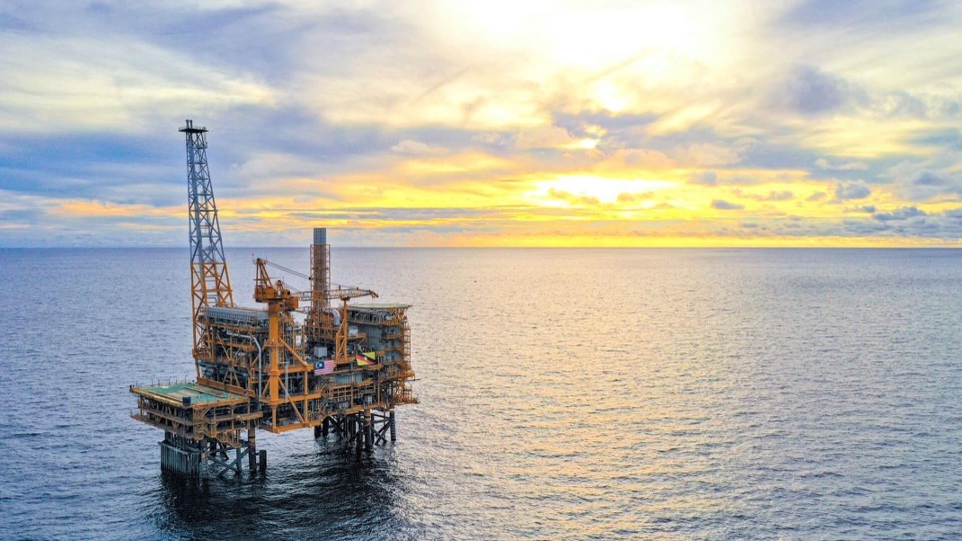 Offshore oil rig at sunrise