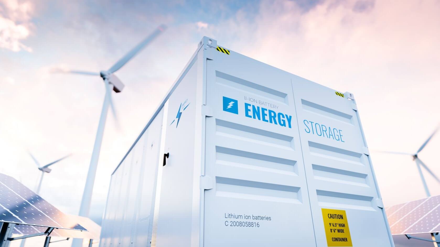 White energy storage container with solar panels and wind turbines either side