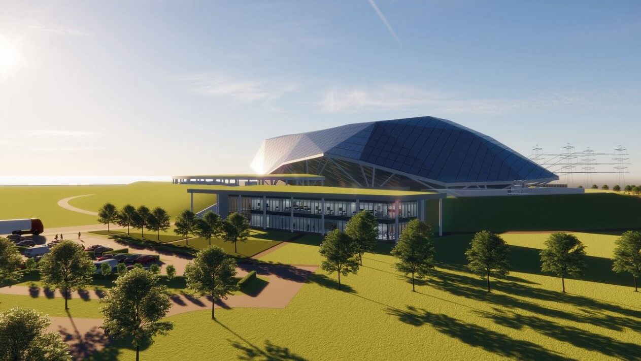 Computer generated image of grey 'hump'-shaped structure set amidst green fields with trees