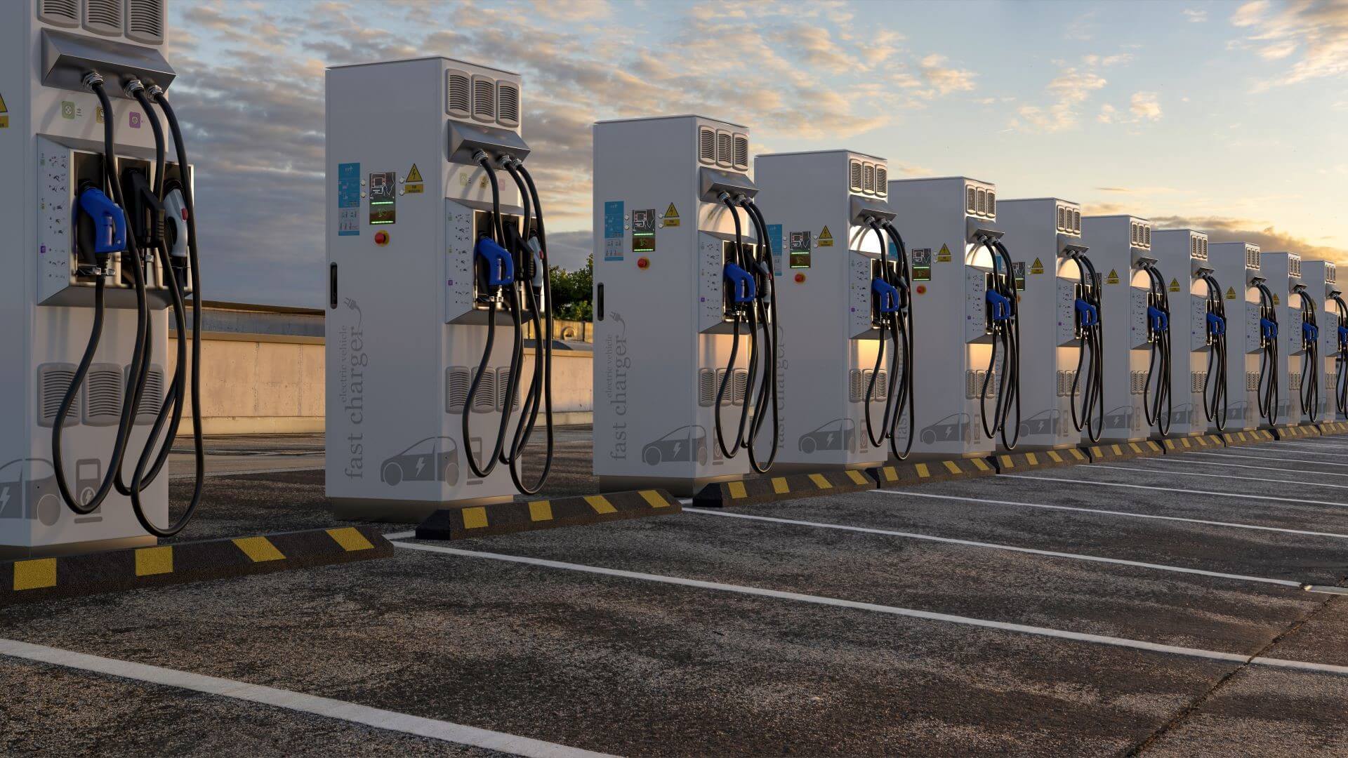 Row of electric chargers at front of parking bays