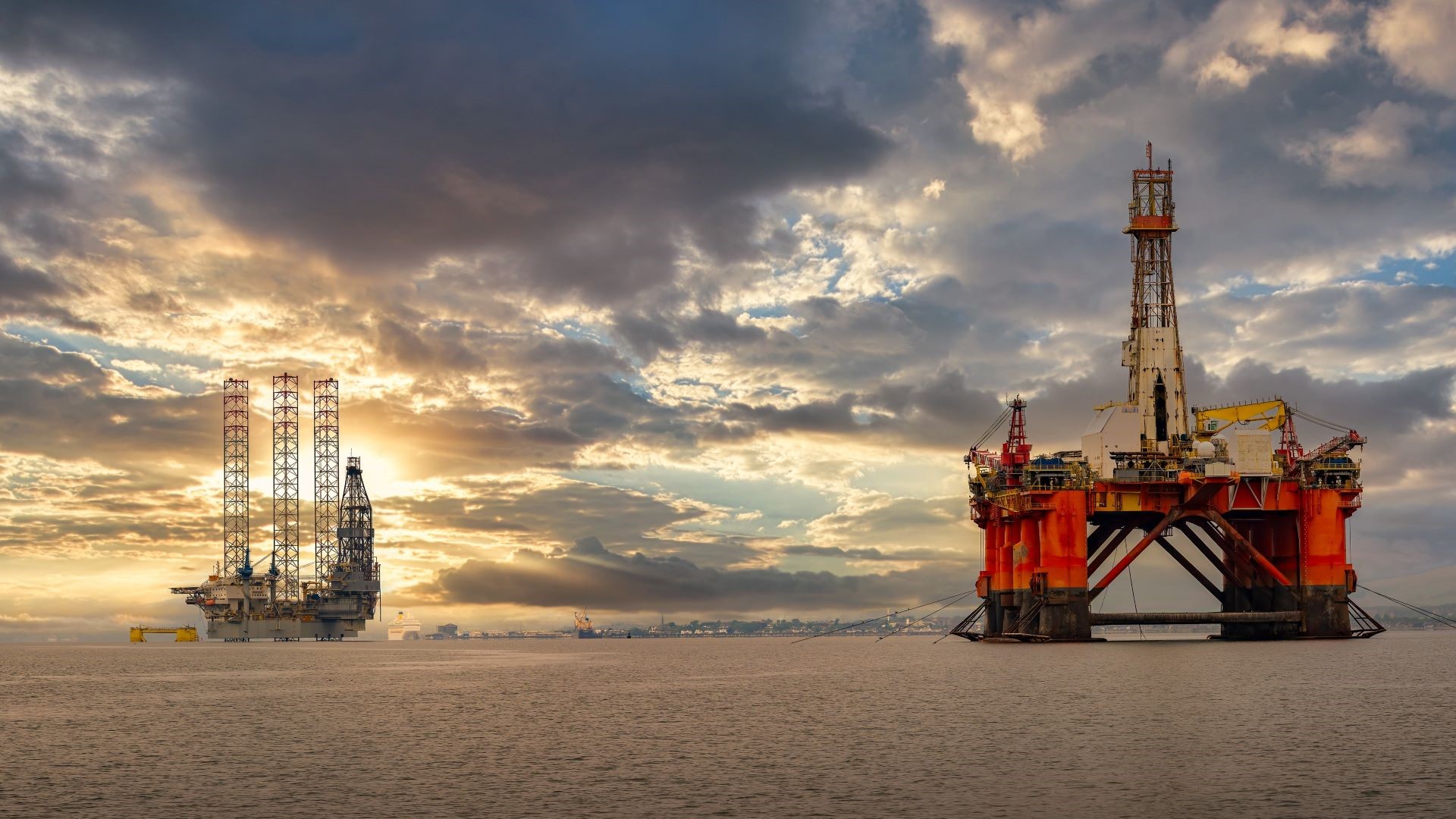 Offshore platforms off the coast of Scotland at sunset