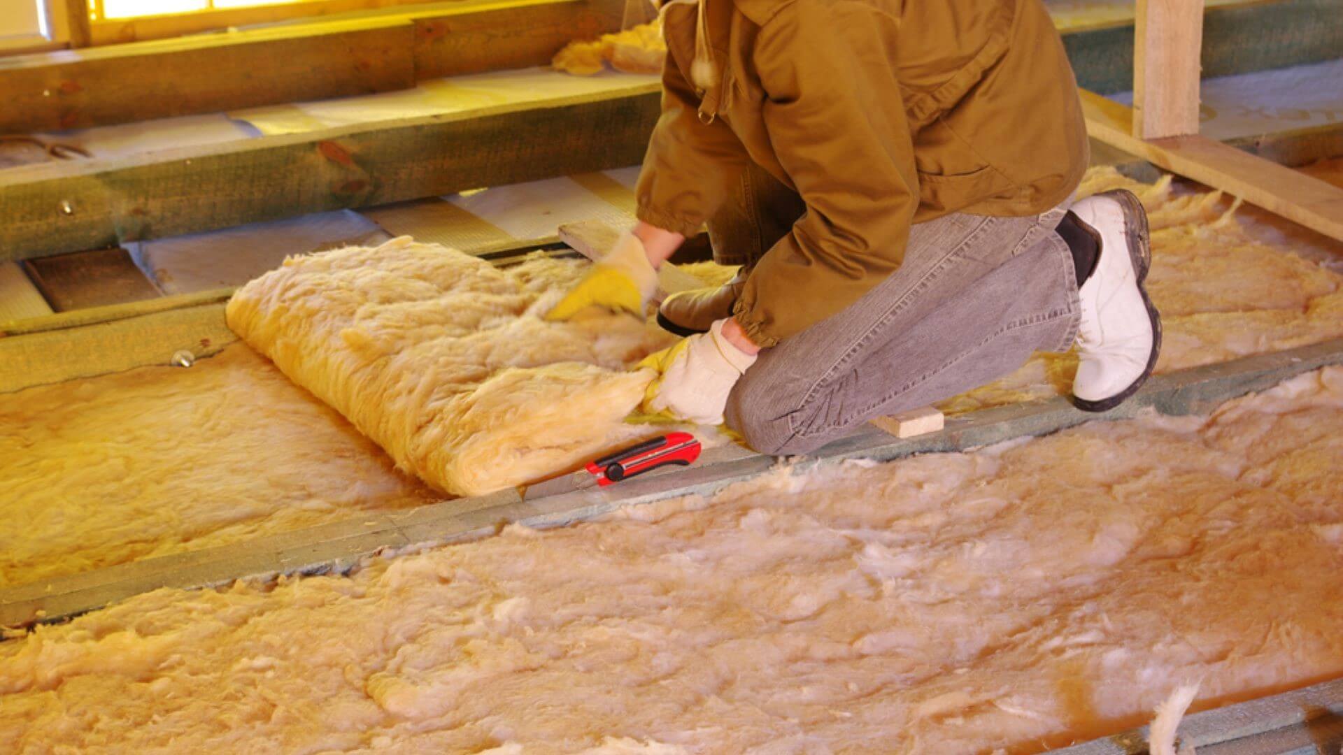 Insulation being fitted inside a house