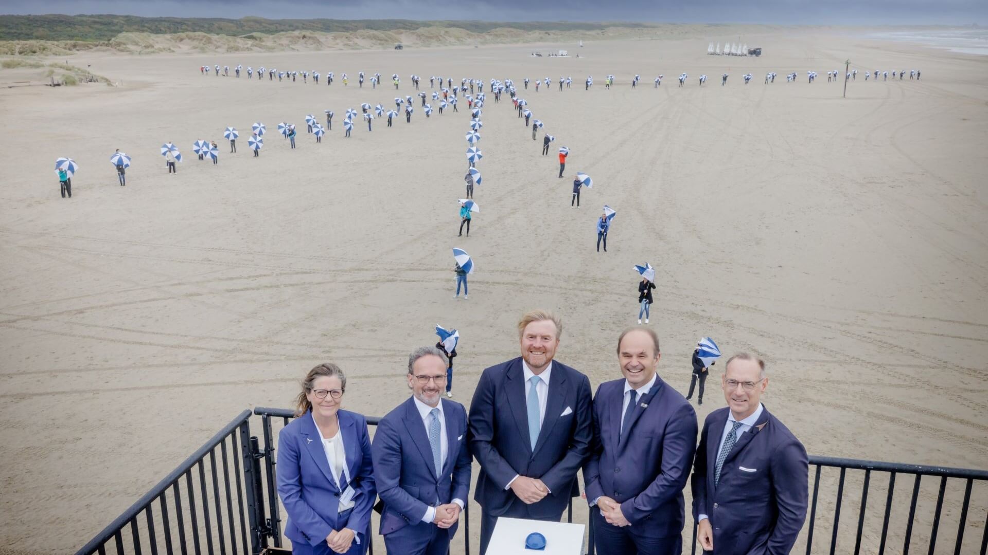 Officials on beach at inauguration of Hollandse Kust Zuid wind farm 