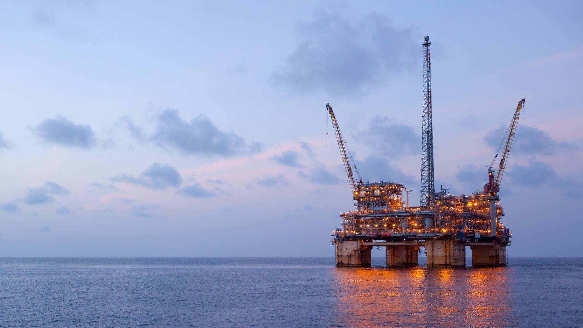 Offshore oil platform at dusk