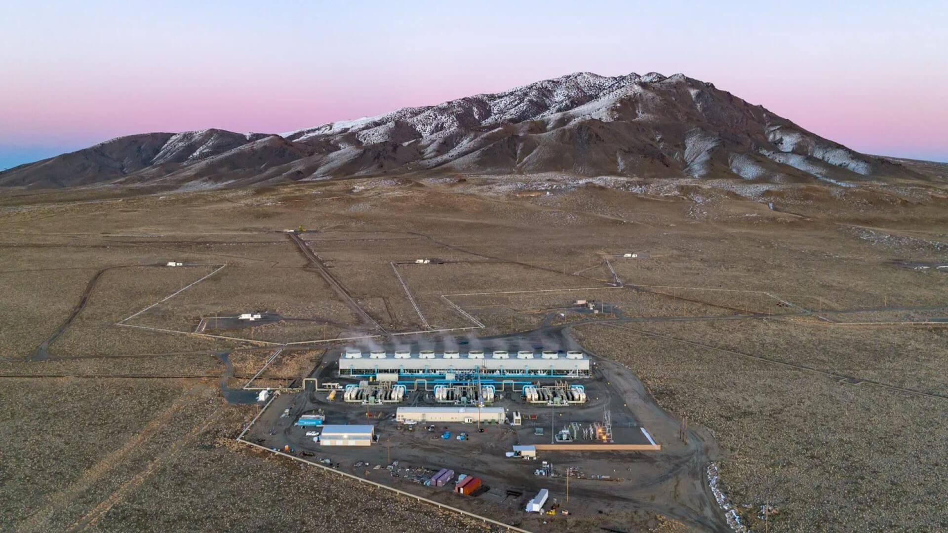 Aerial view of geothermal site amongst mountains in Nevada