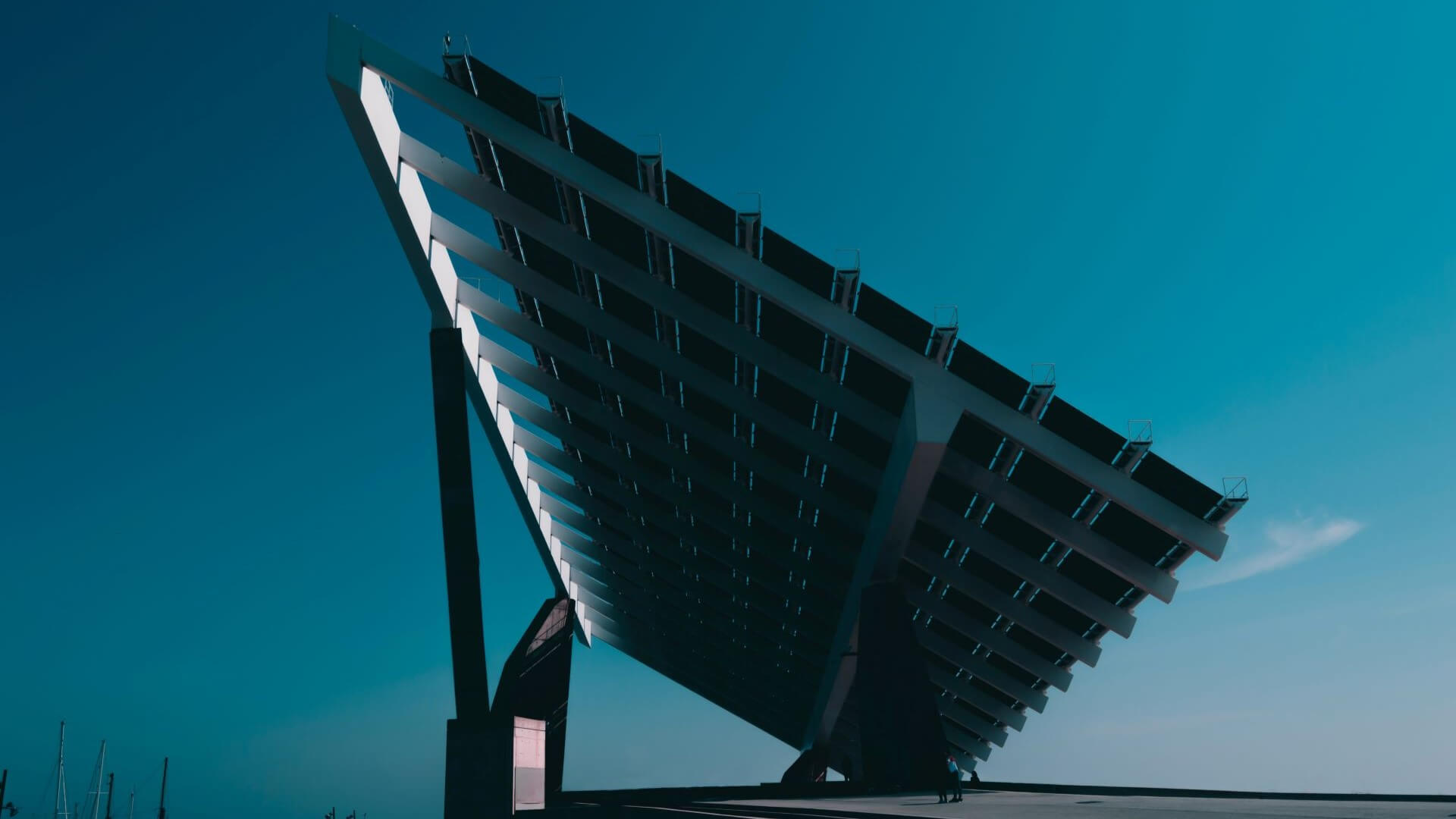 View under a large solar panel looking up