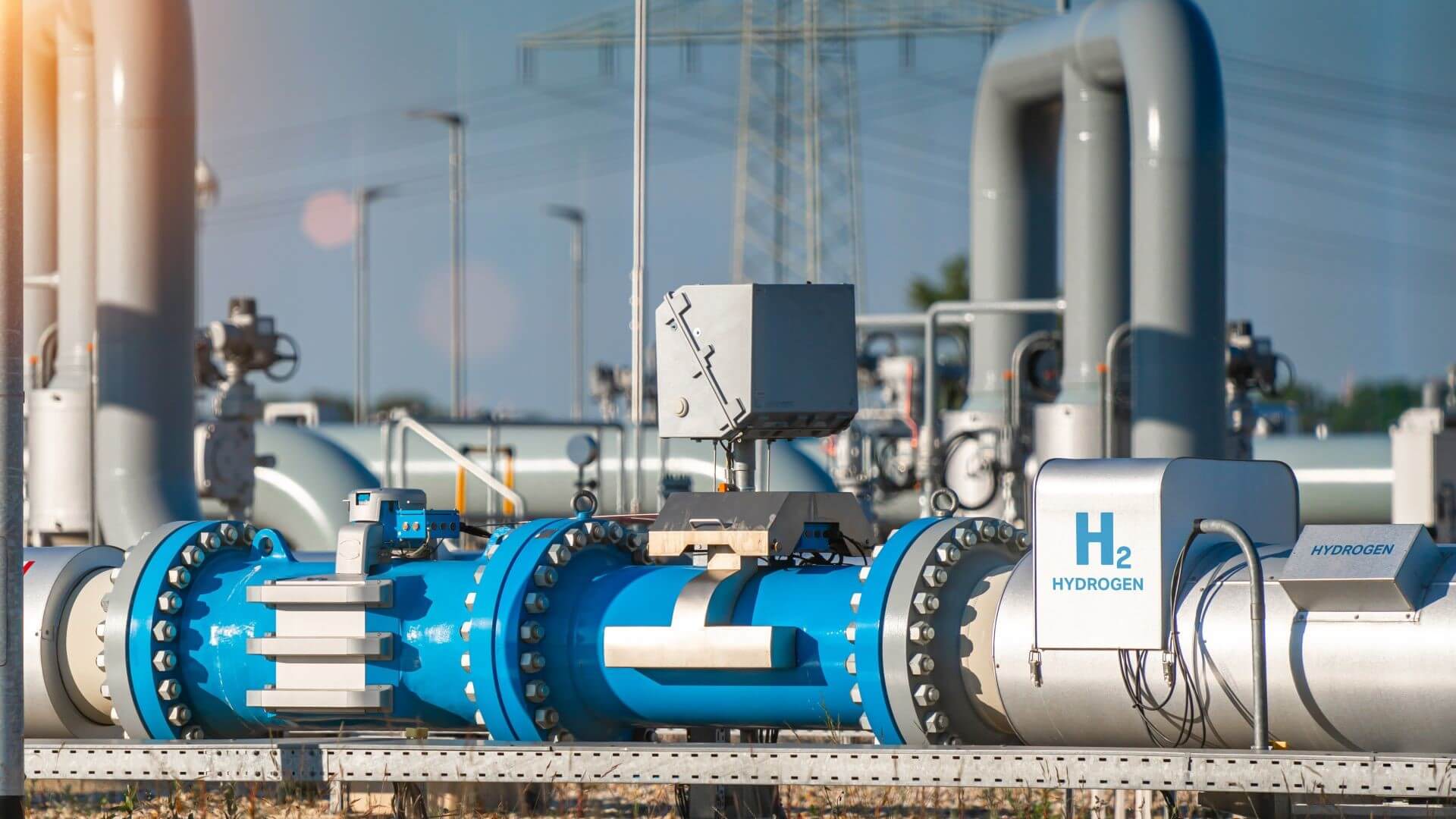Close up of pipework with H2 written on it, valves and gauges