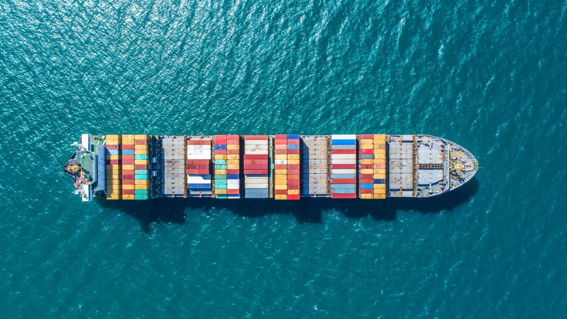 Aerial view of container ship at sea
