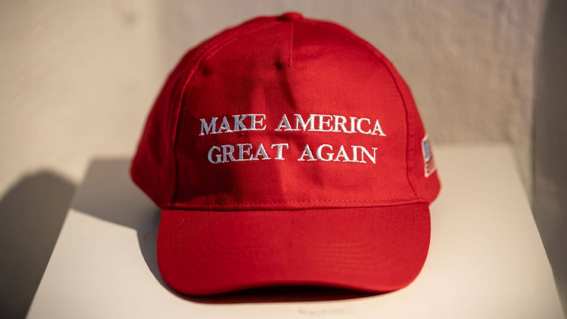 Photo of Donald Trump's Presidential campaign's red baseball cap with slogan 'Make America Great Again'