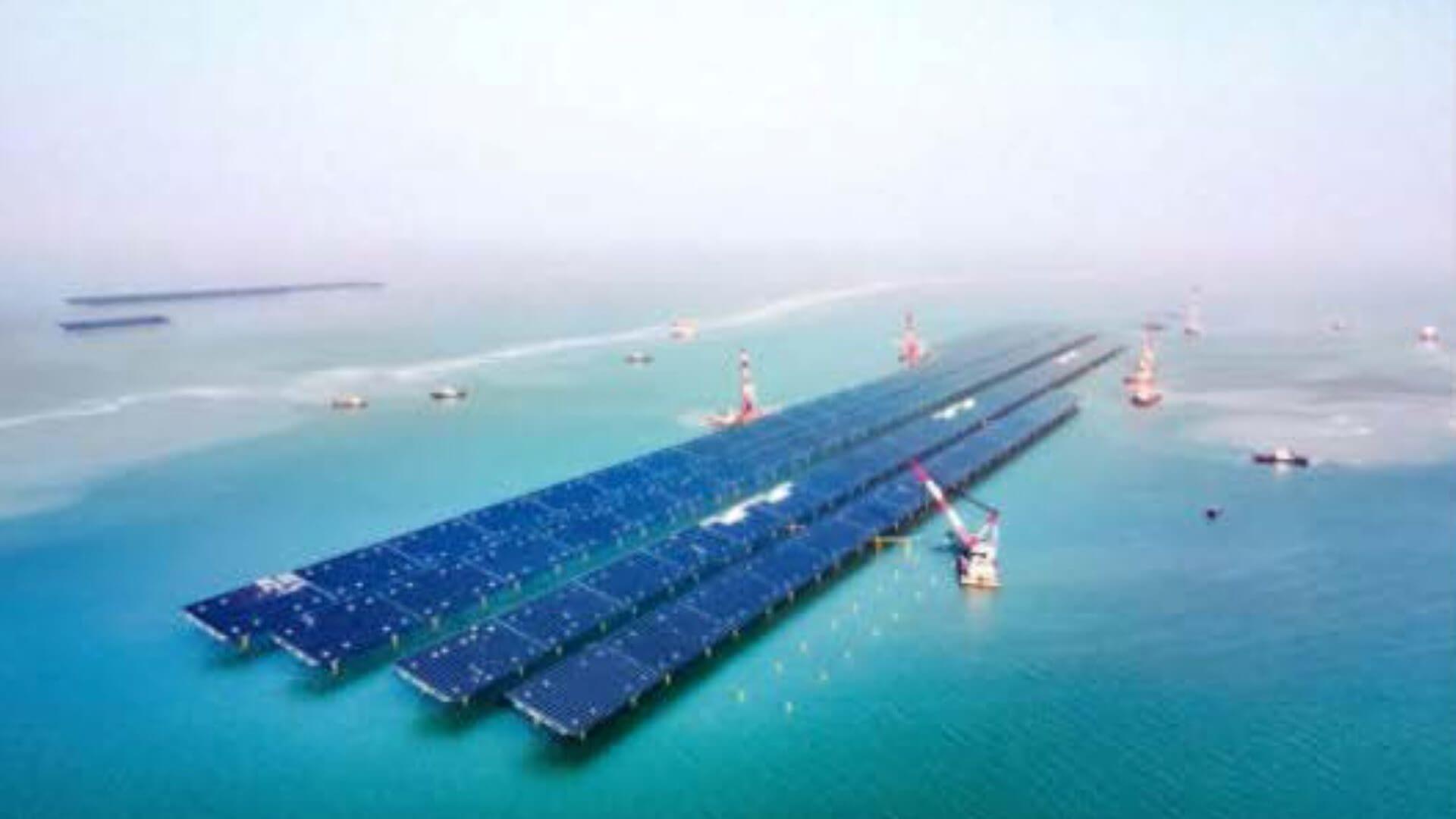A large array of solar panels in the water