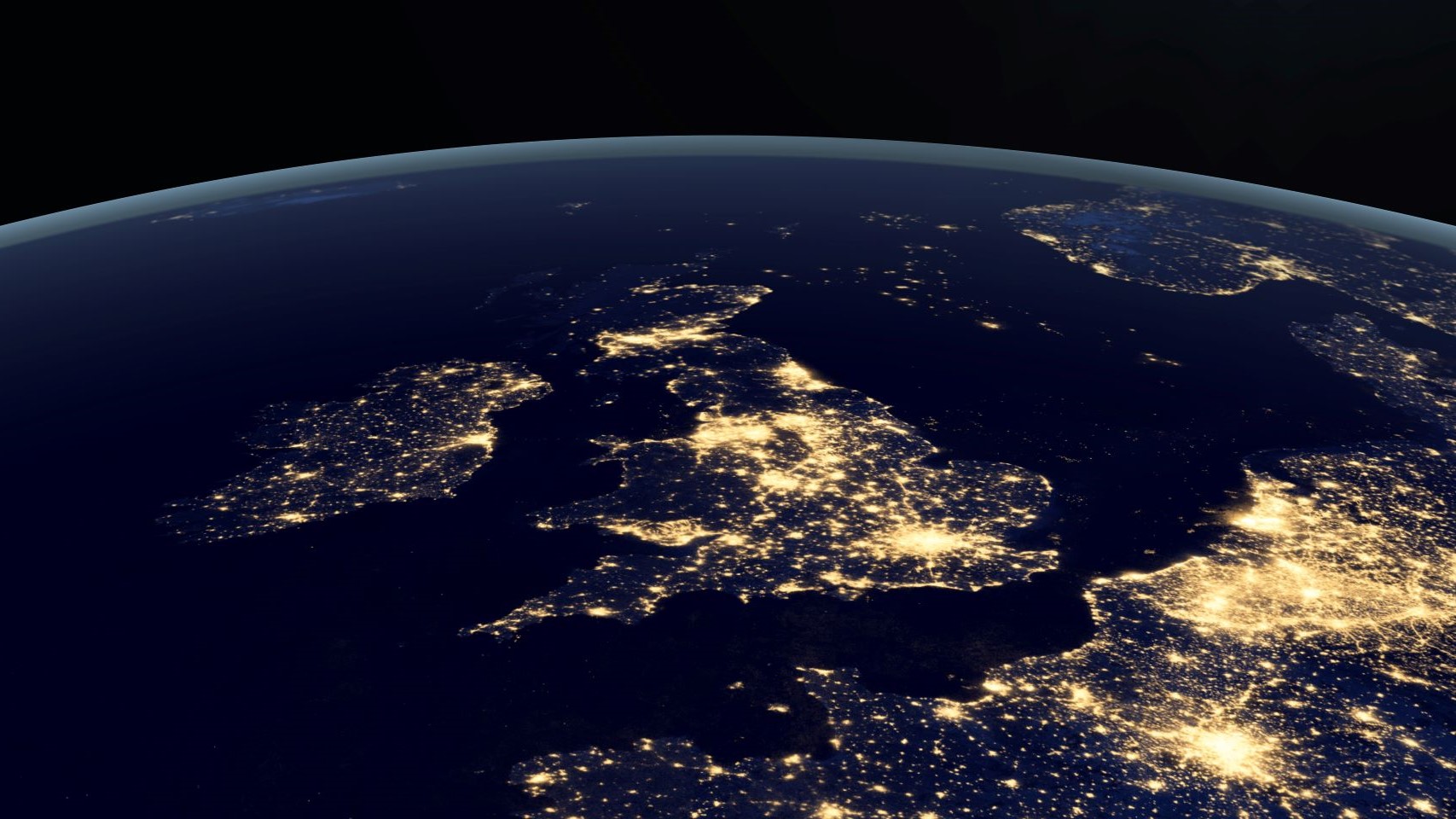 View from space of UK and Europe at night, with bright lights of main city conurbations showing