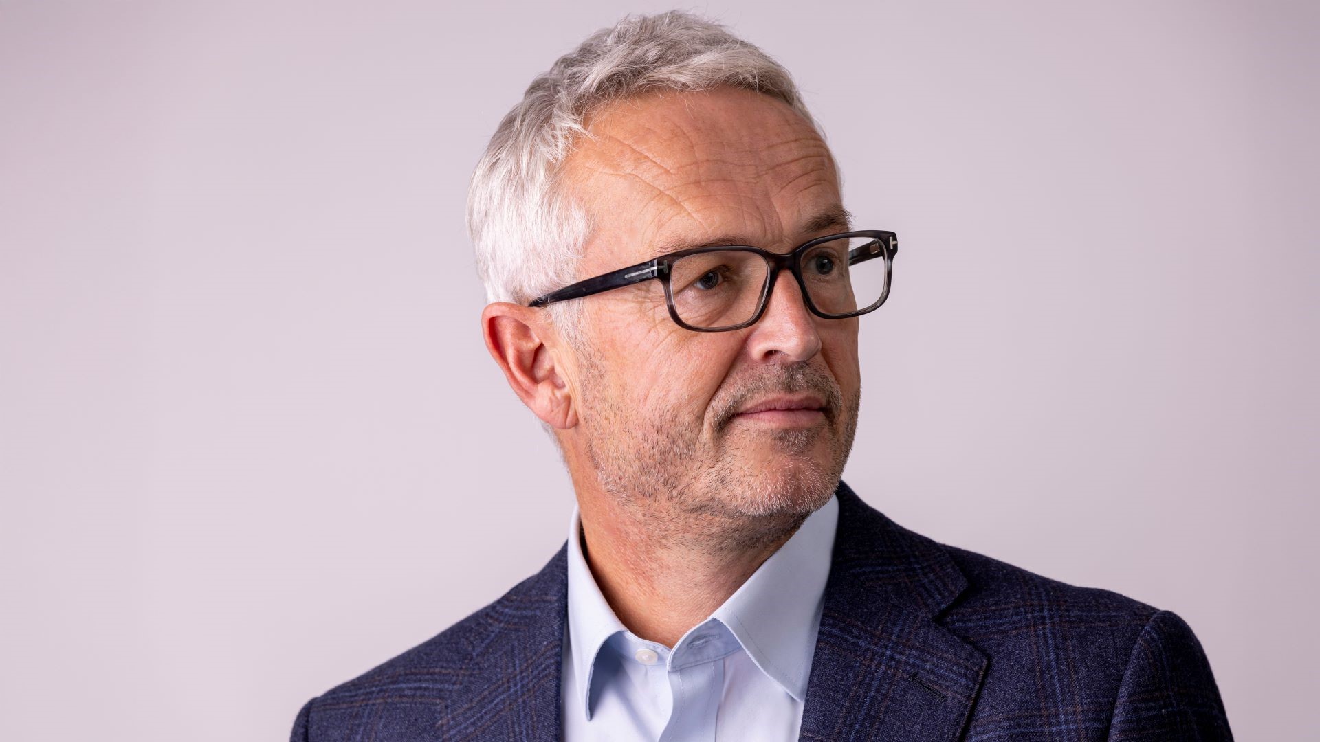 Head and shoulders photo of Bjørn Otto Sverdrup, Chair of OGCI's Executive Committee, set against a pinkish grey background