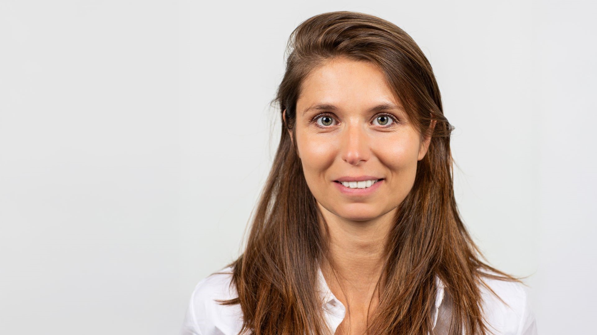 Head and shoulders photo of Florence Carlot, set against grey background