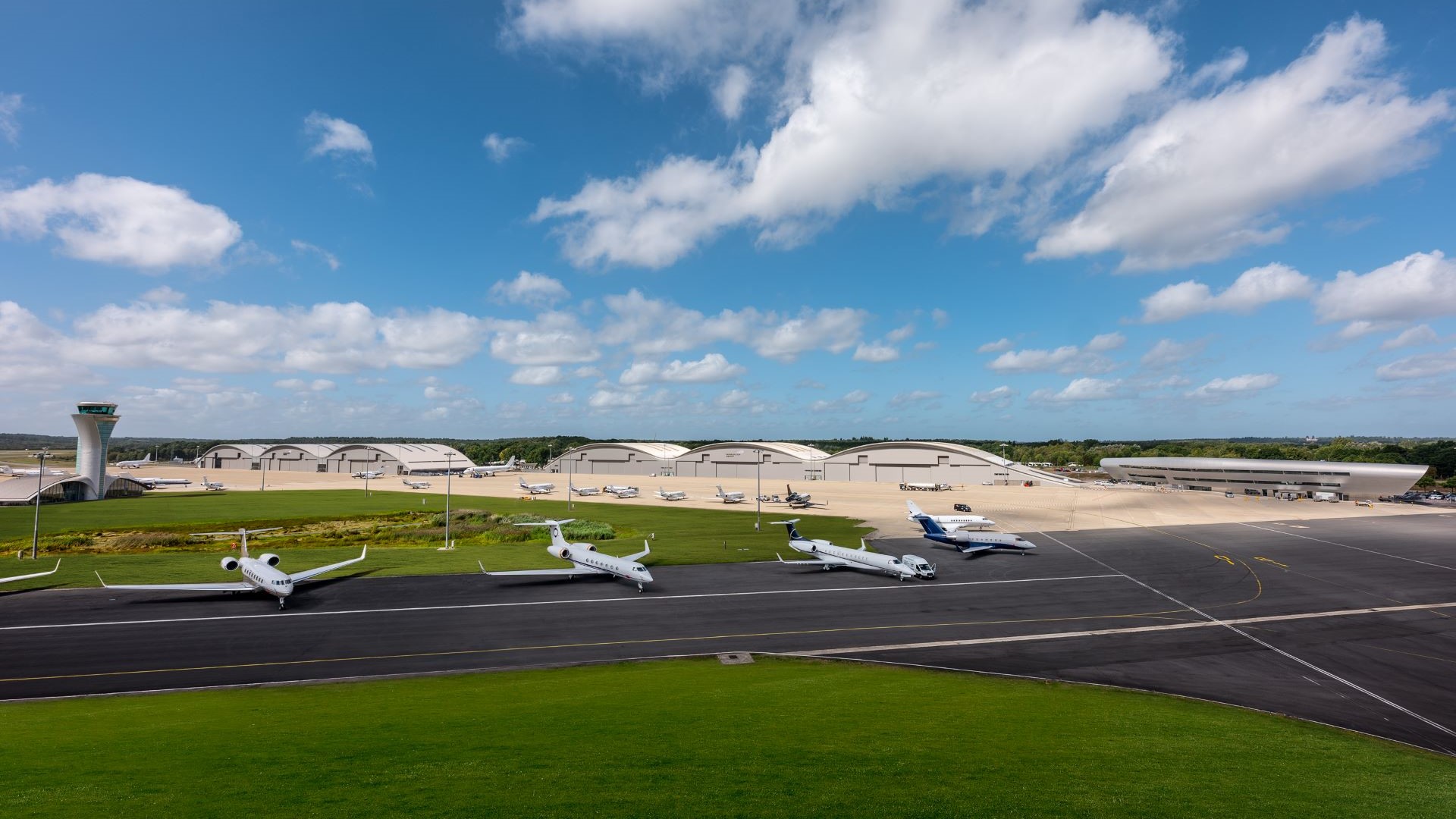 Aerial view of Farnborough Airport runway and aircraft