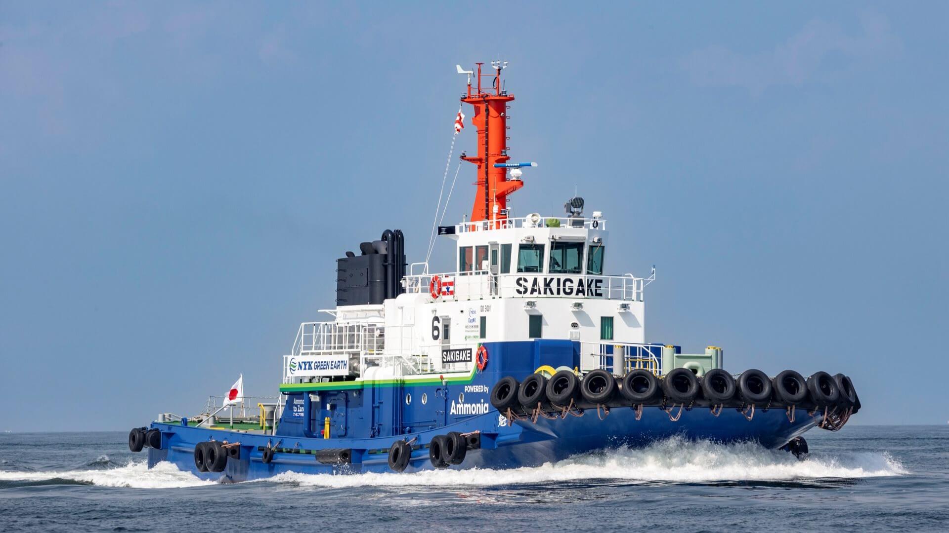 Close up photo of small tug boat in calm sea