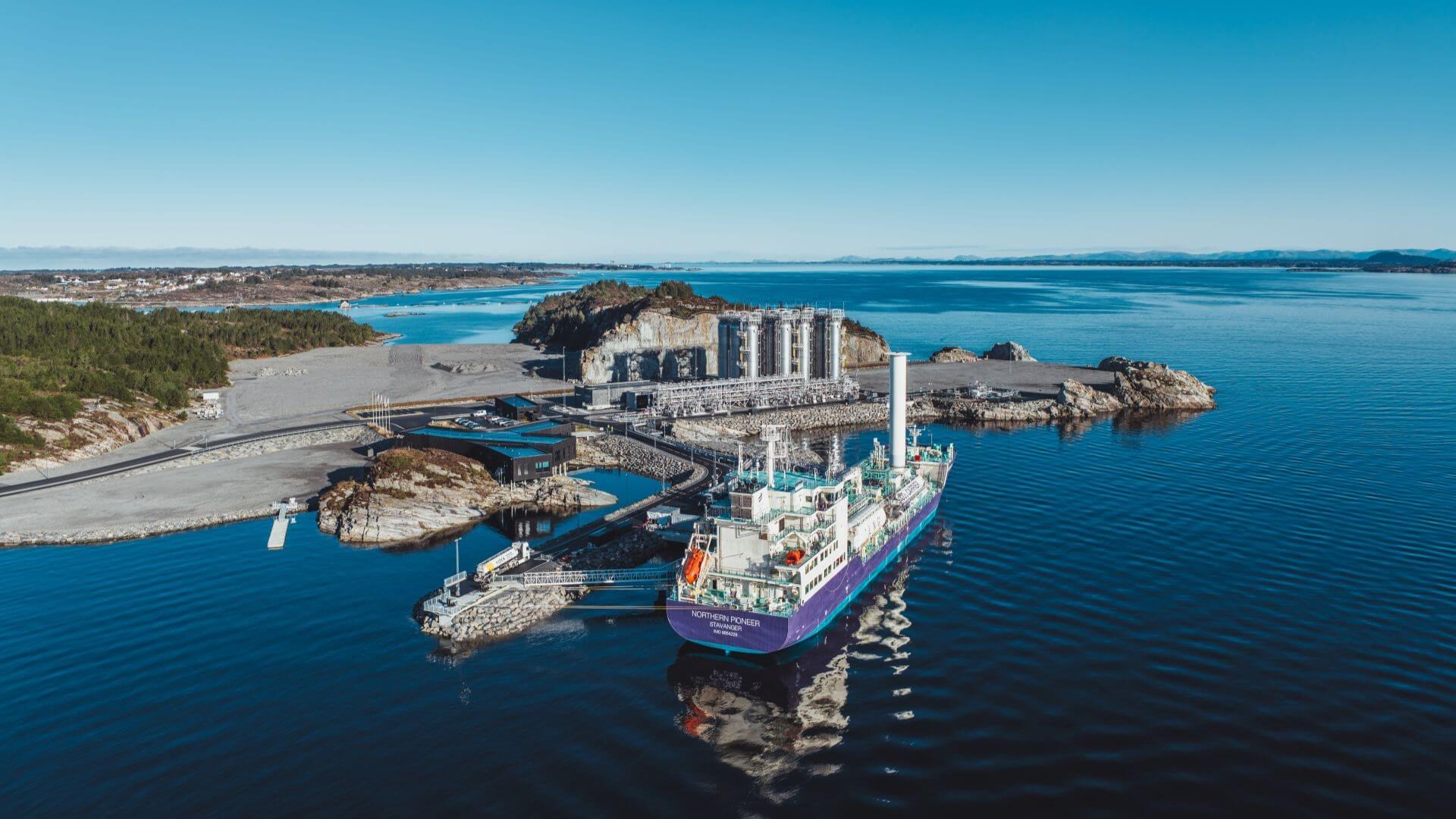 Aerial view of ship docked alongside terminal
