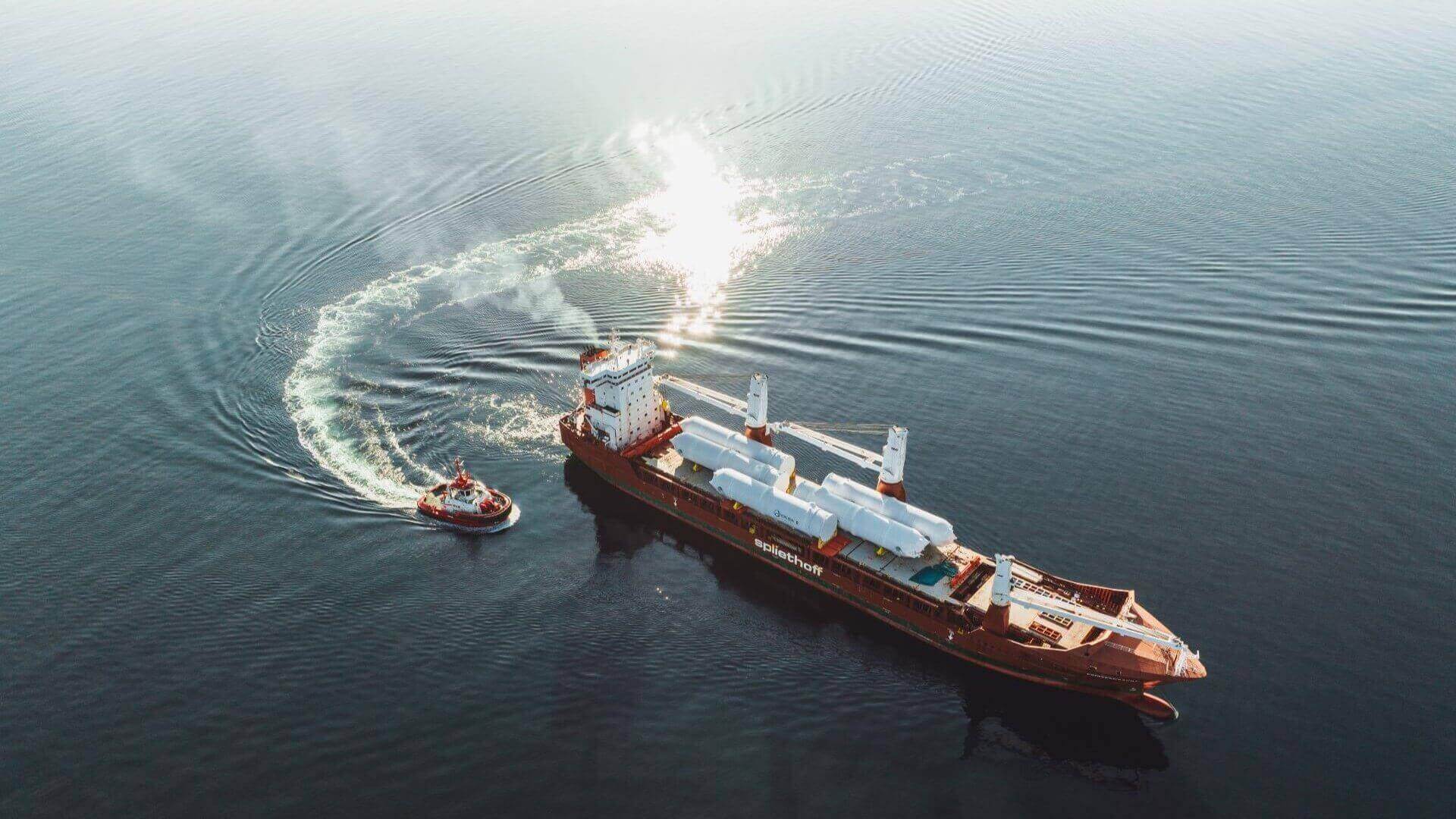 Aerial view of ship at sea carrying storage tanks