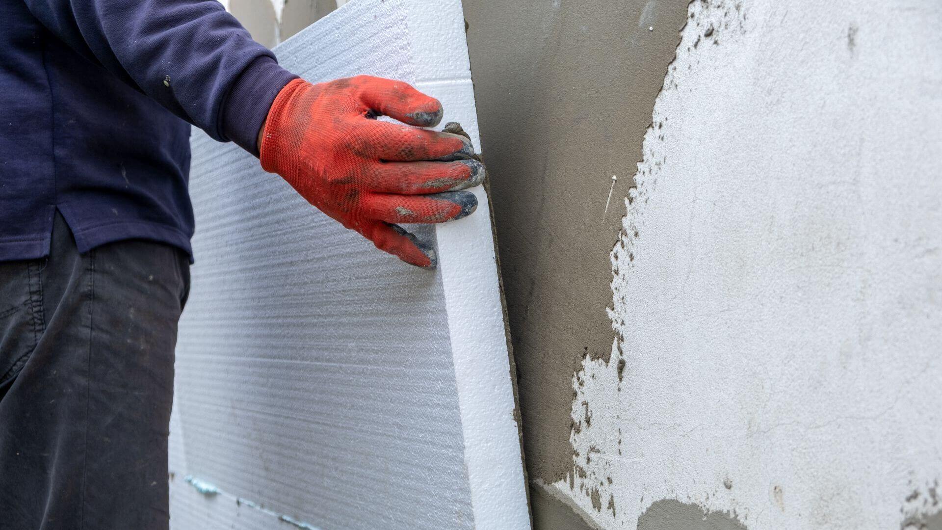 Wall insulation being installed