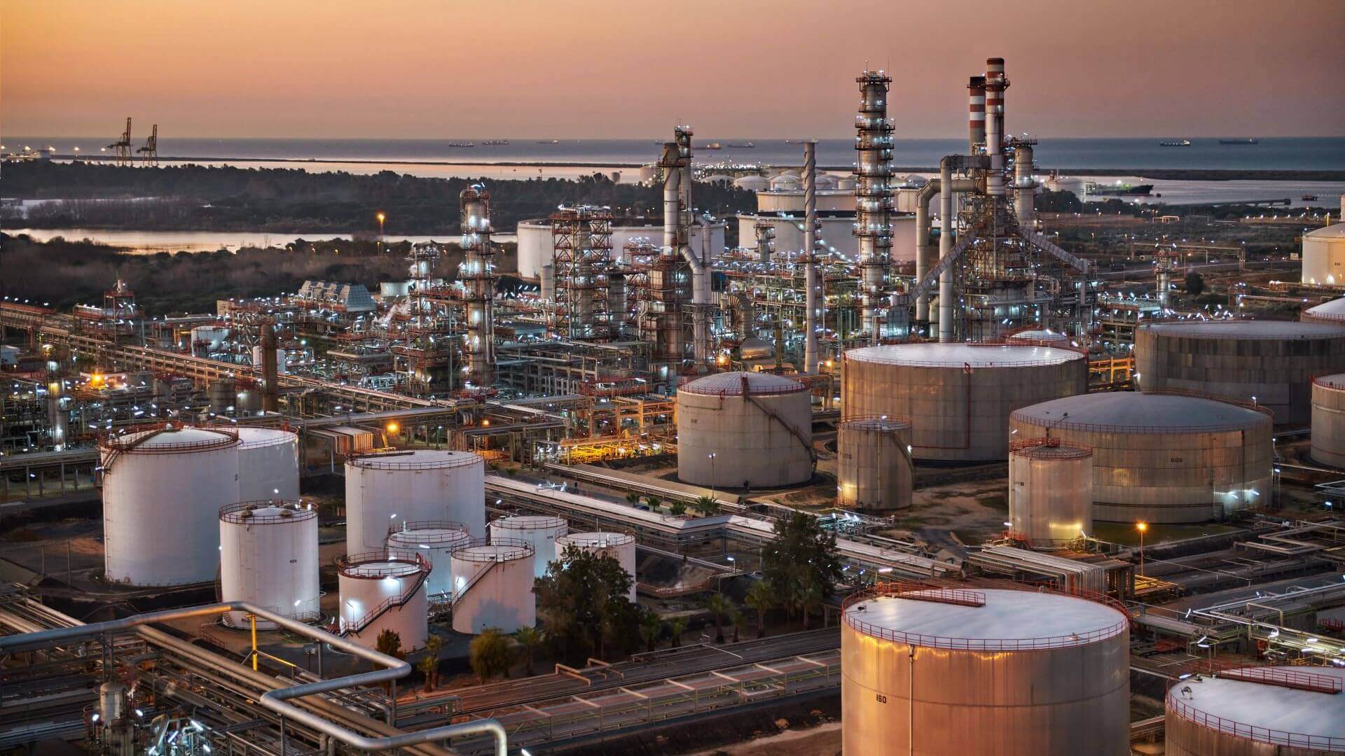 Refinery lit up at dusk